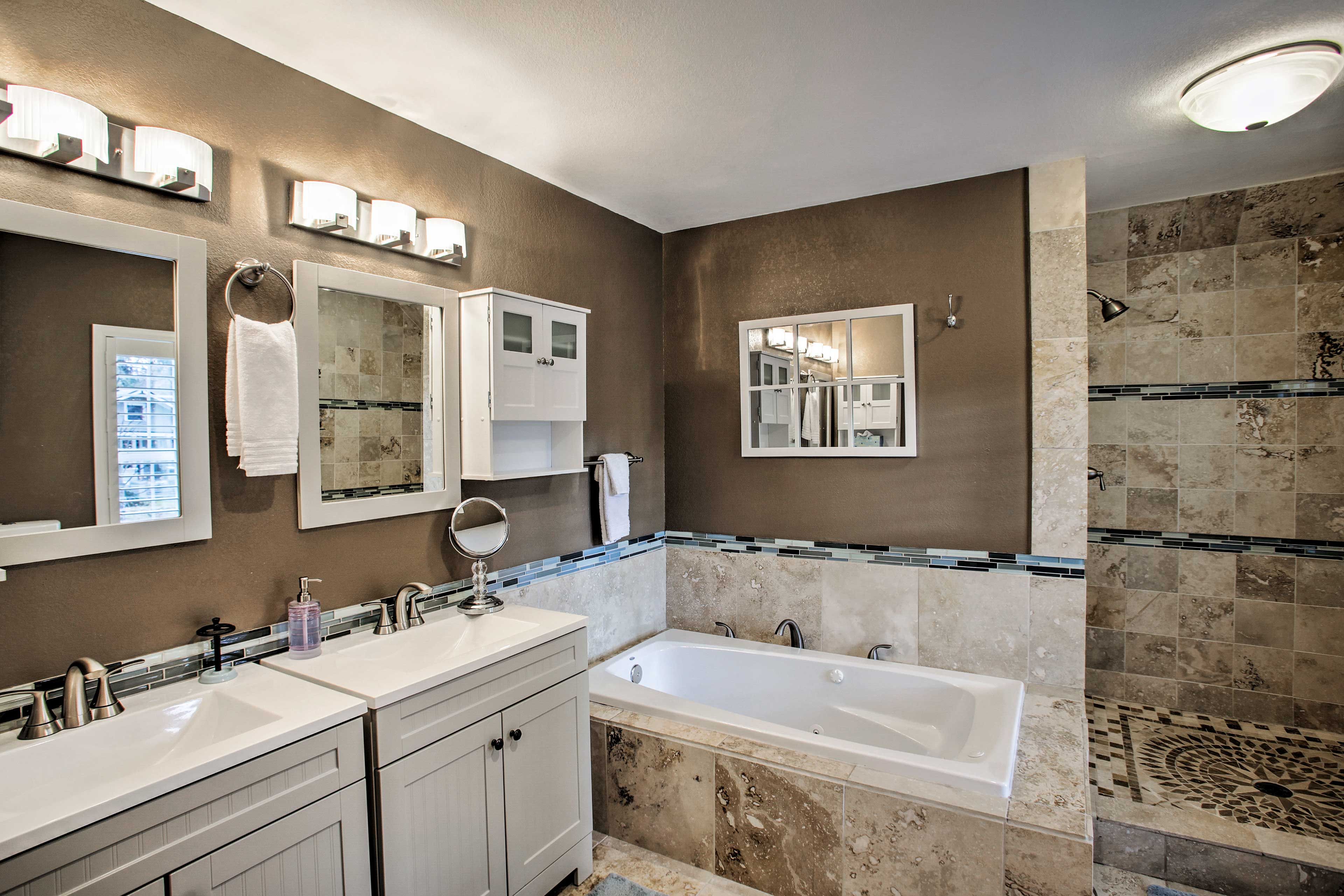 Sink into the large tub and enjoy a relaxing start to your day.