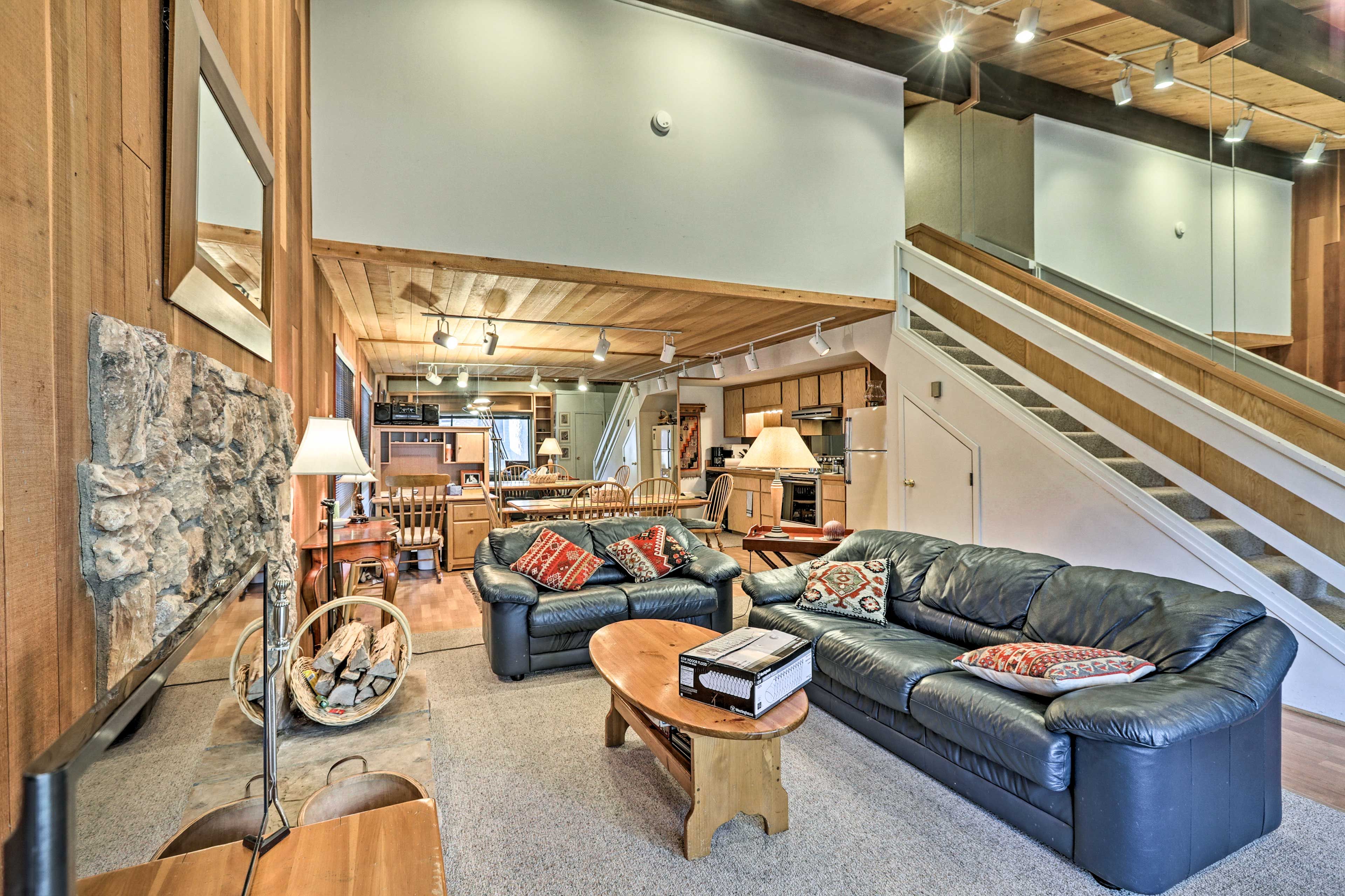 Rest your feet as you sit on the leather sofa.