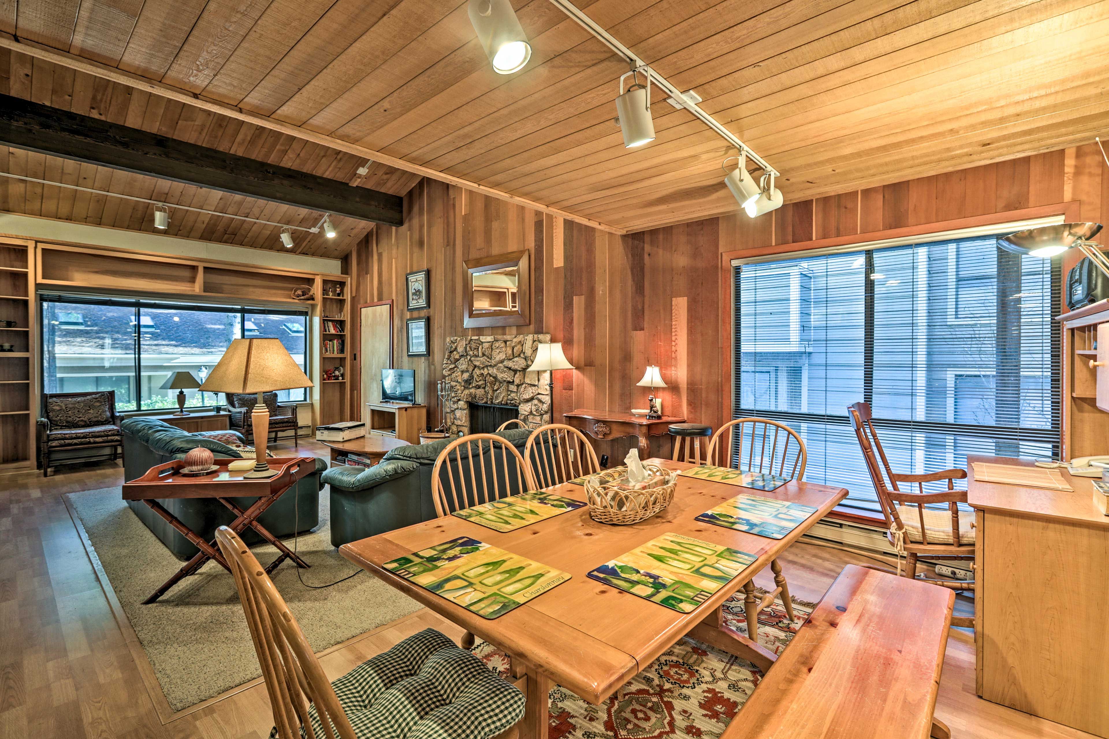 Gather around the wooden dining table.