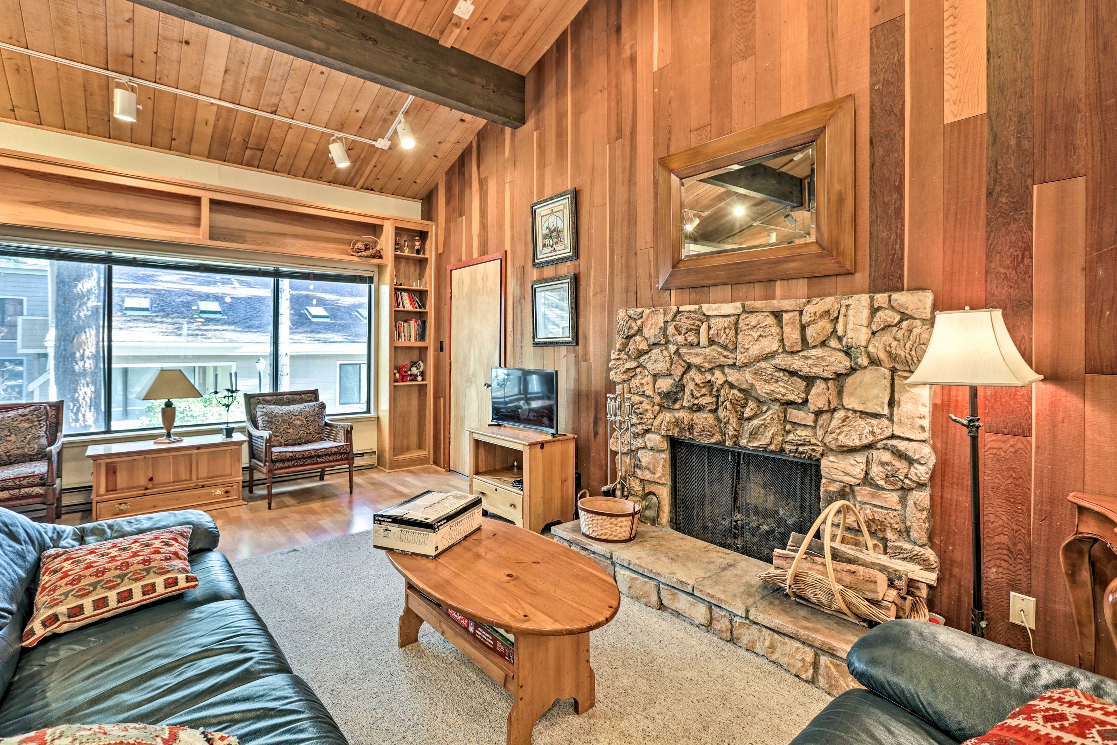 Get cozy in front of the stone fireplace.