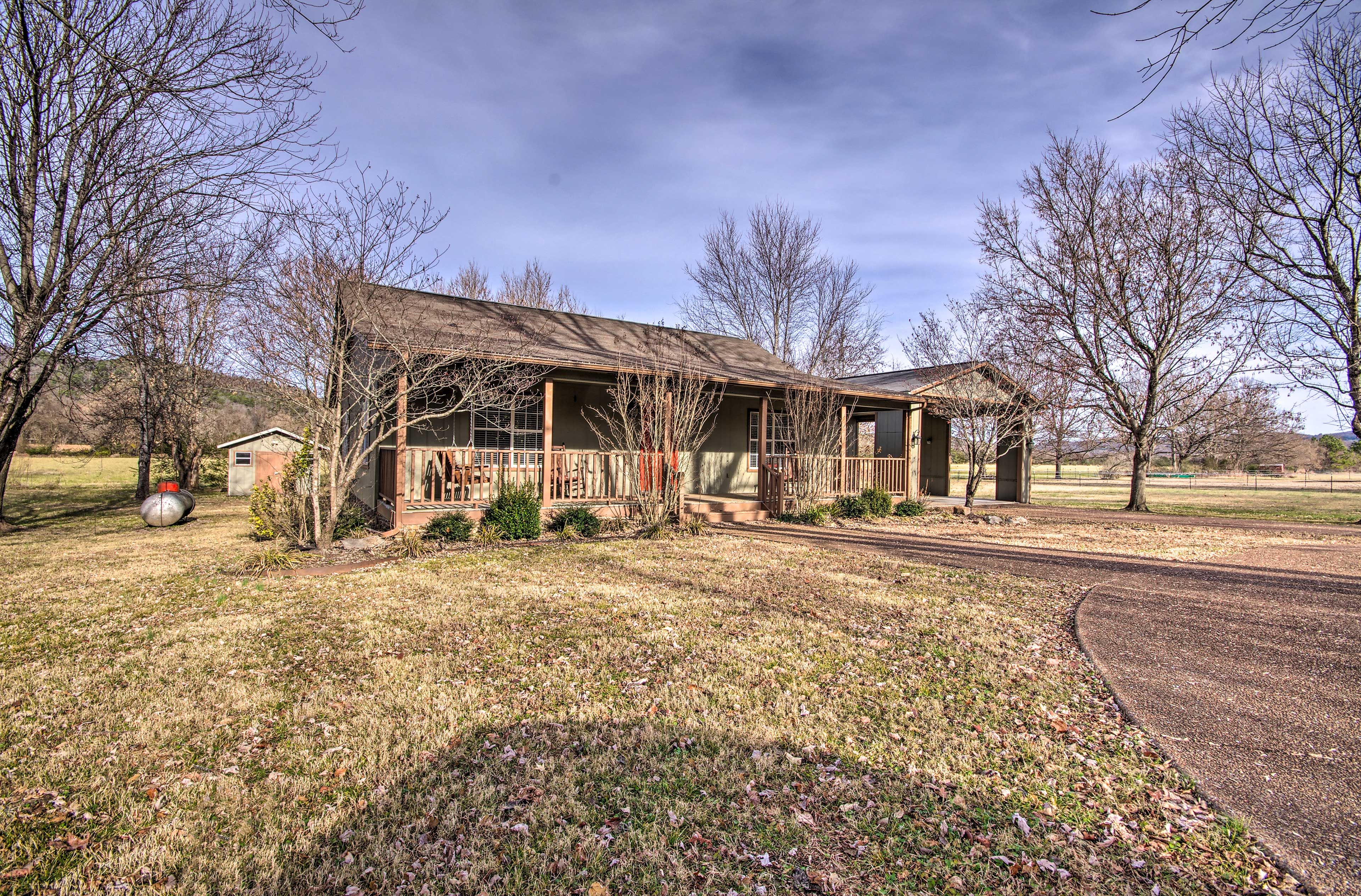 The home features garage and driveway parking for up to 4 vehicles.