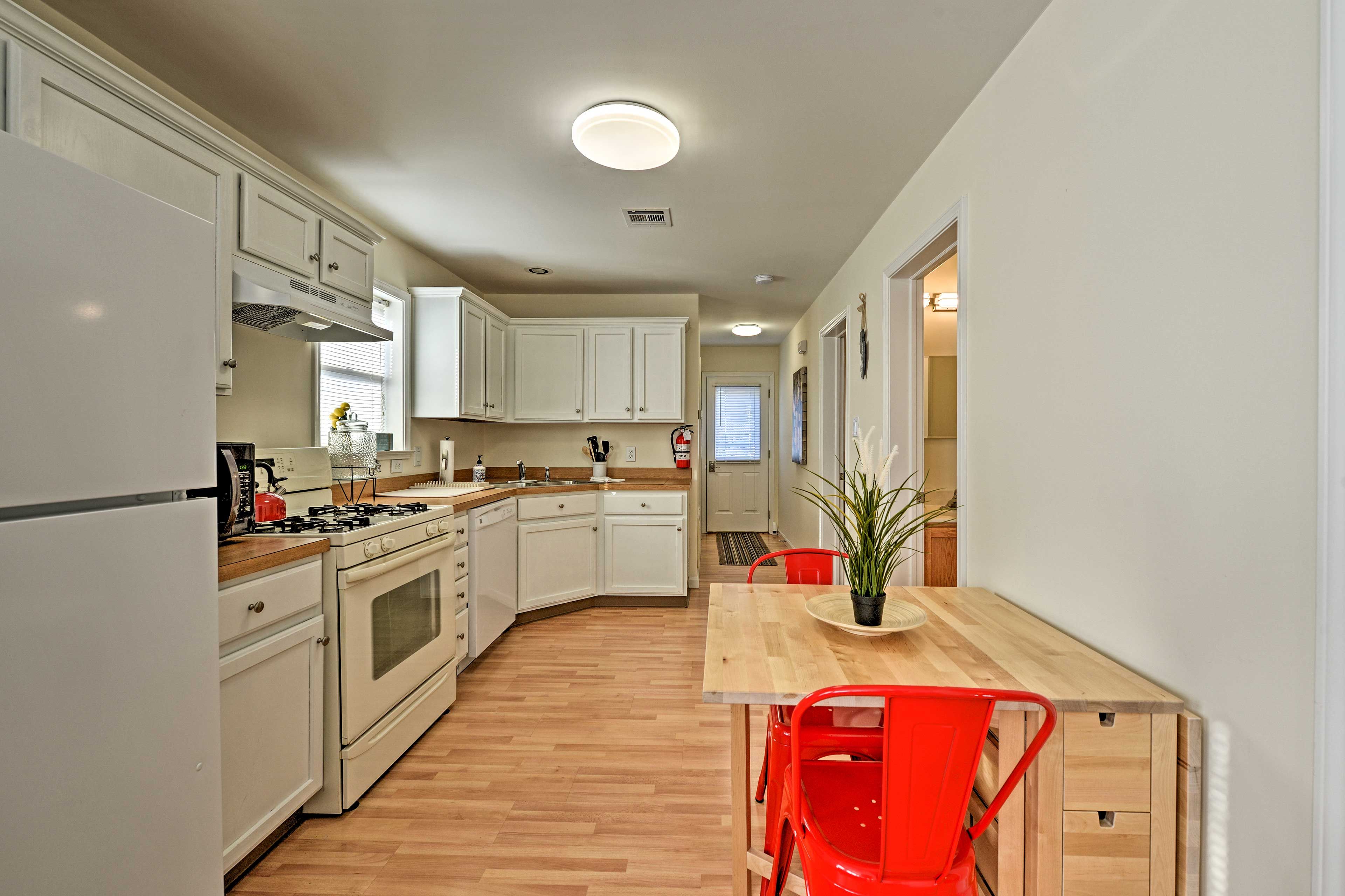 The updated kitchen is fully stocked with all the cooking basics you'll need.