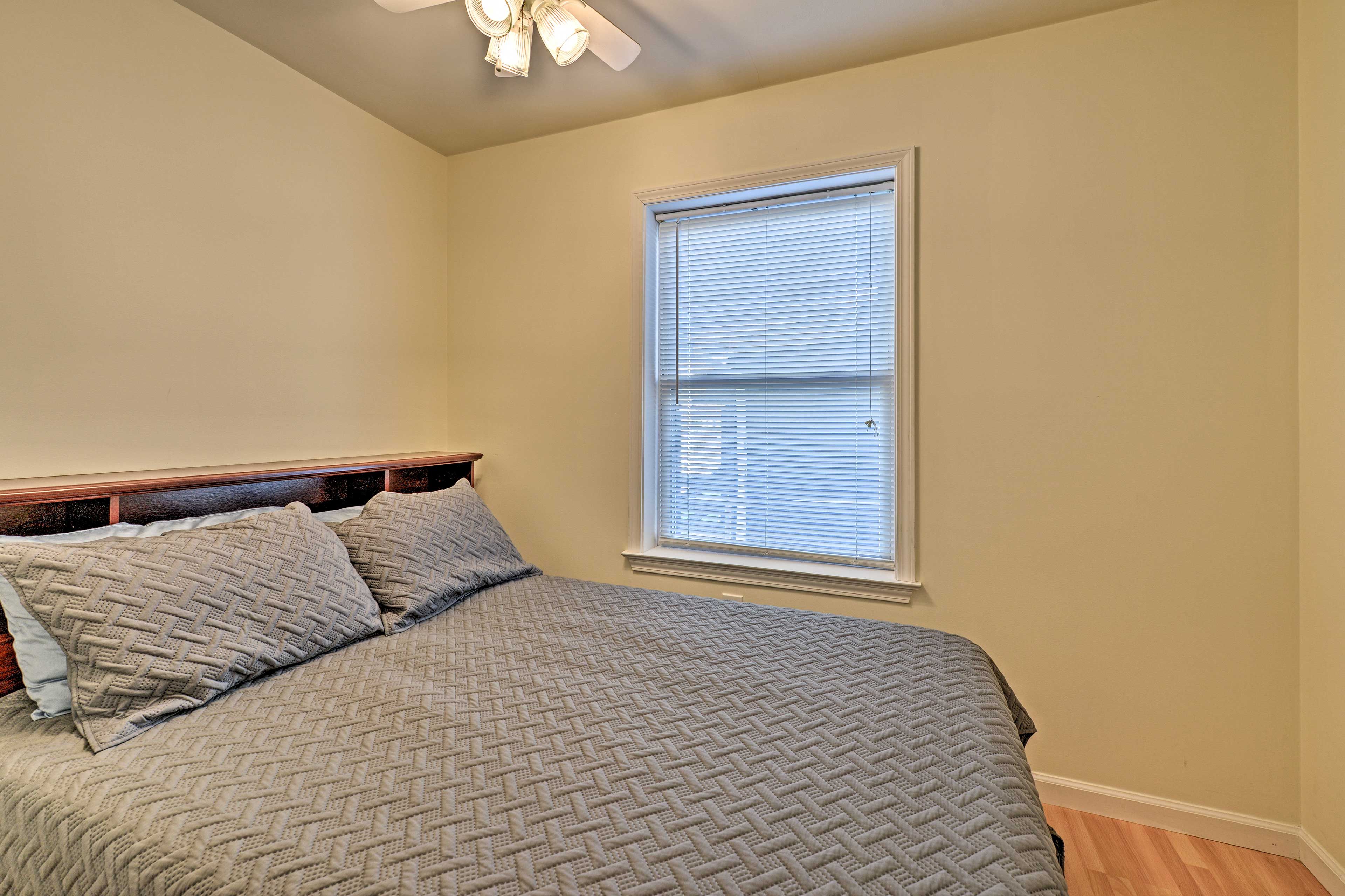 Enjoy the comfort of the full-sized bed in this bedroom.