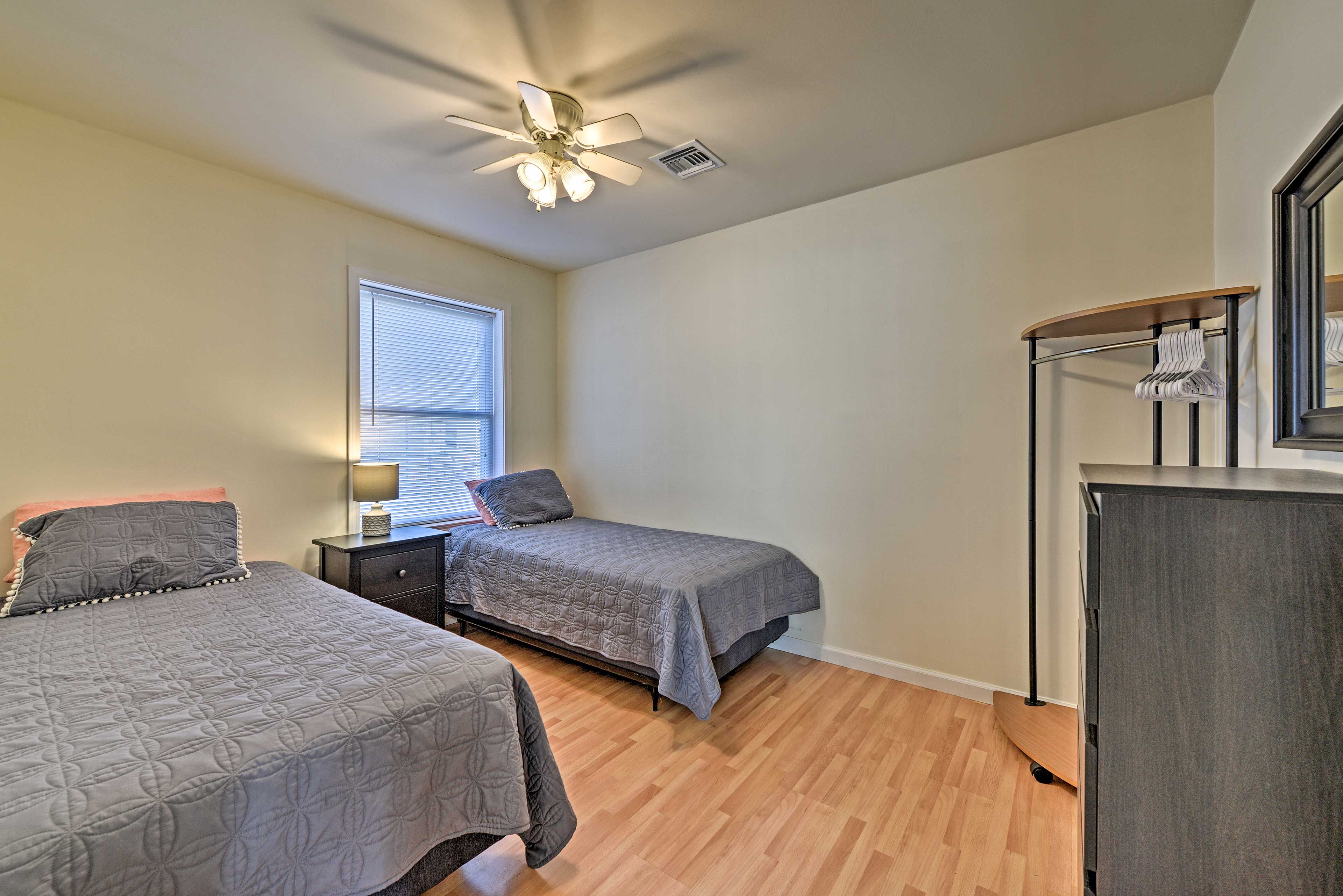 The second bedroom features 2 twin-sized beds.