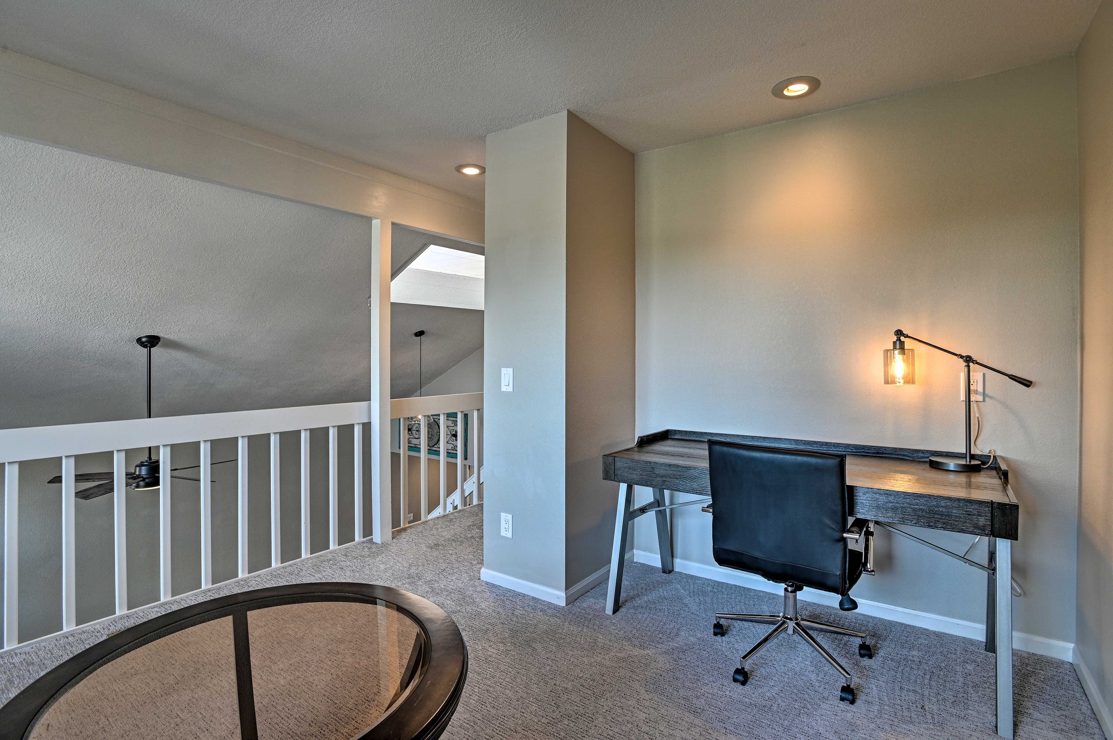 Plan the day's adventures at the desk area.