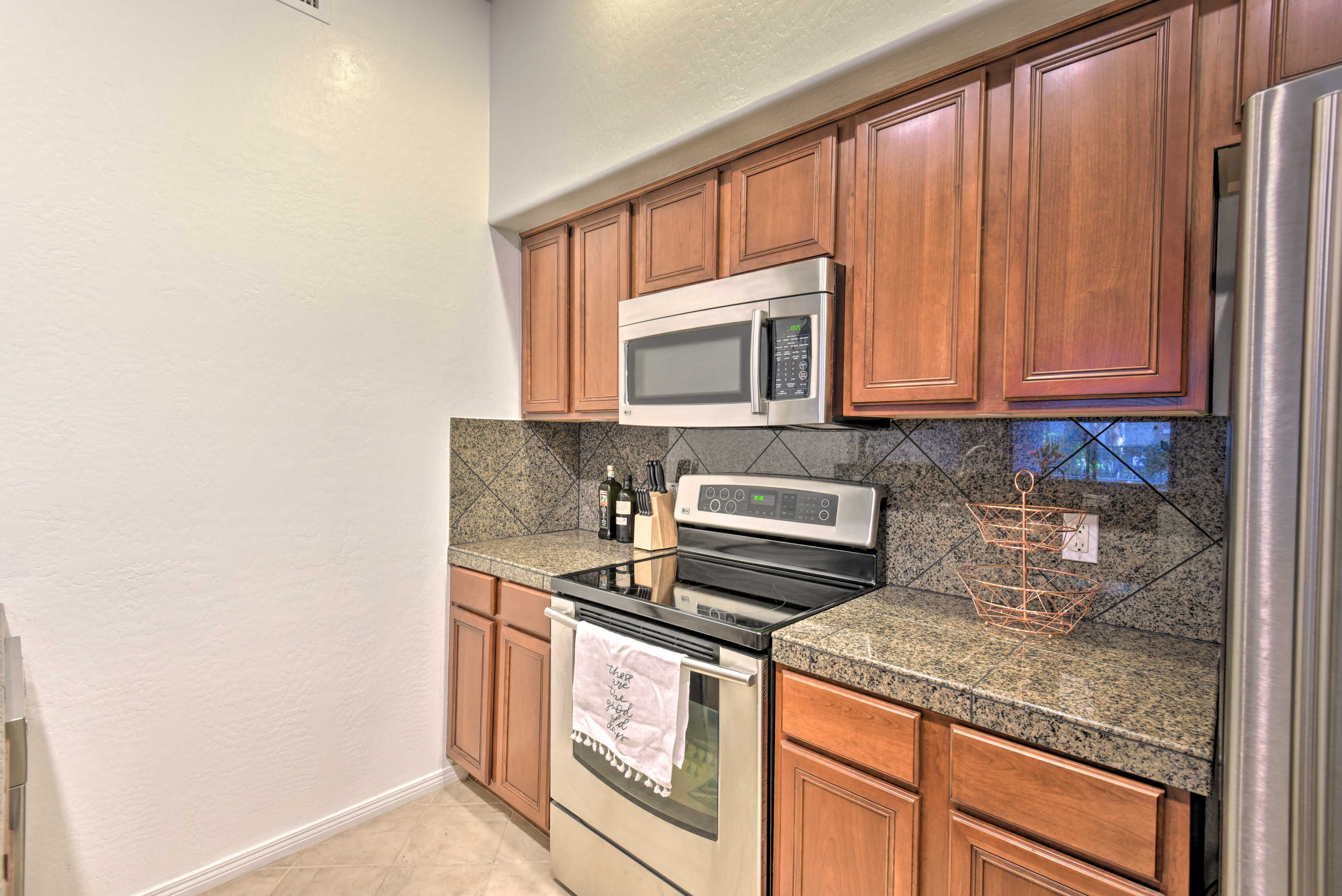 Prep your meals on the granite countertop.