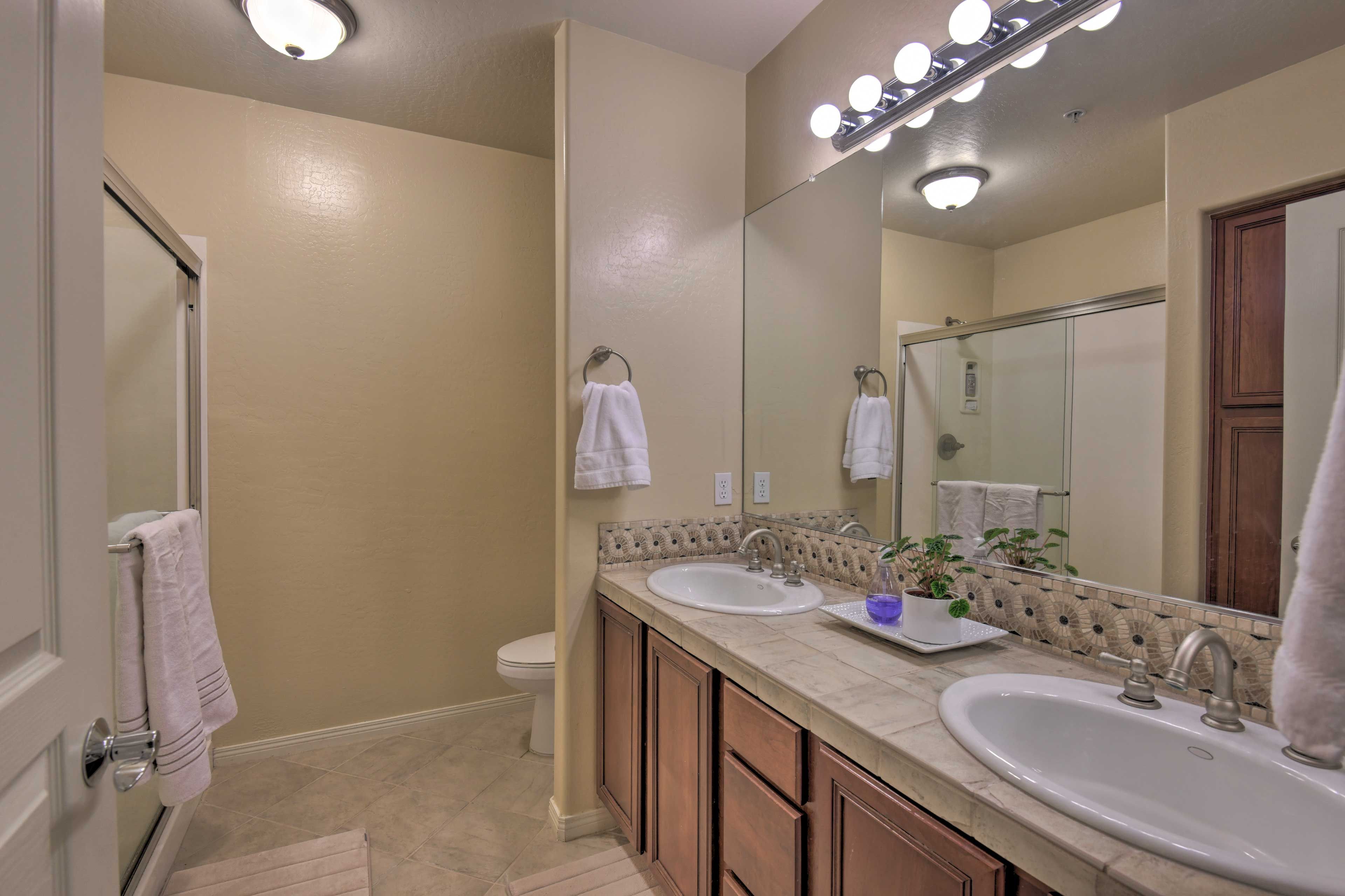Freshen up in the en-suite bathroom.