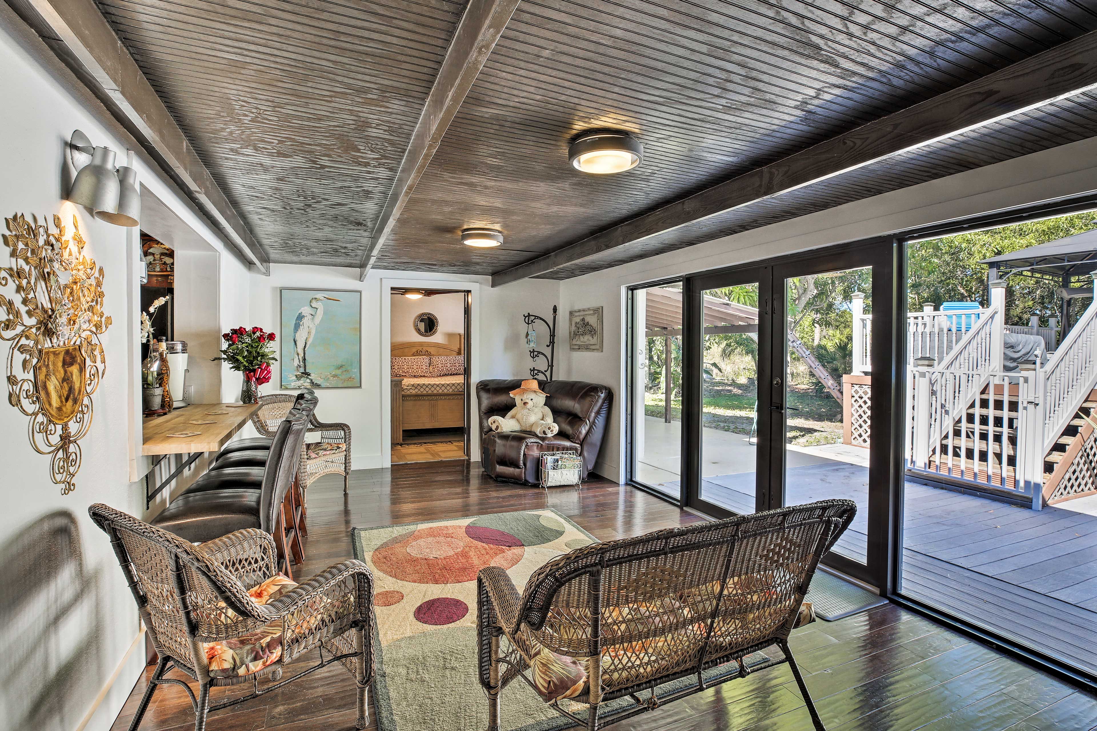 Open up the doors and let the breeze keep you cool in the Florida room.