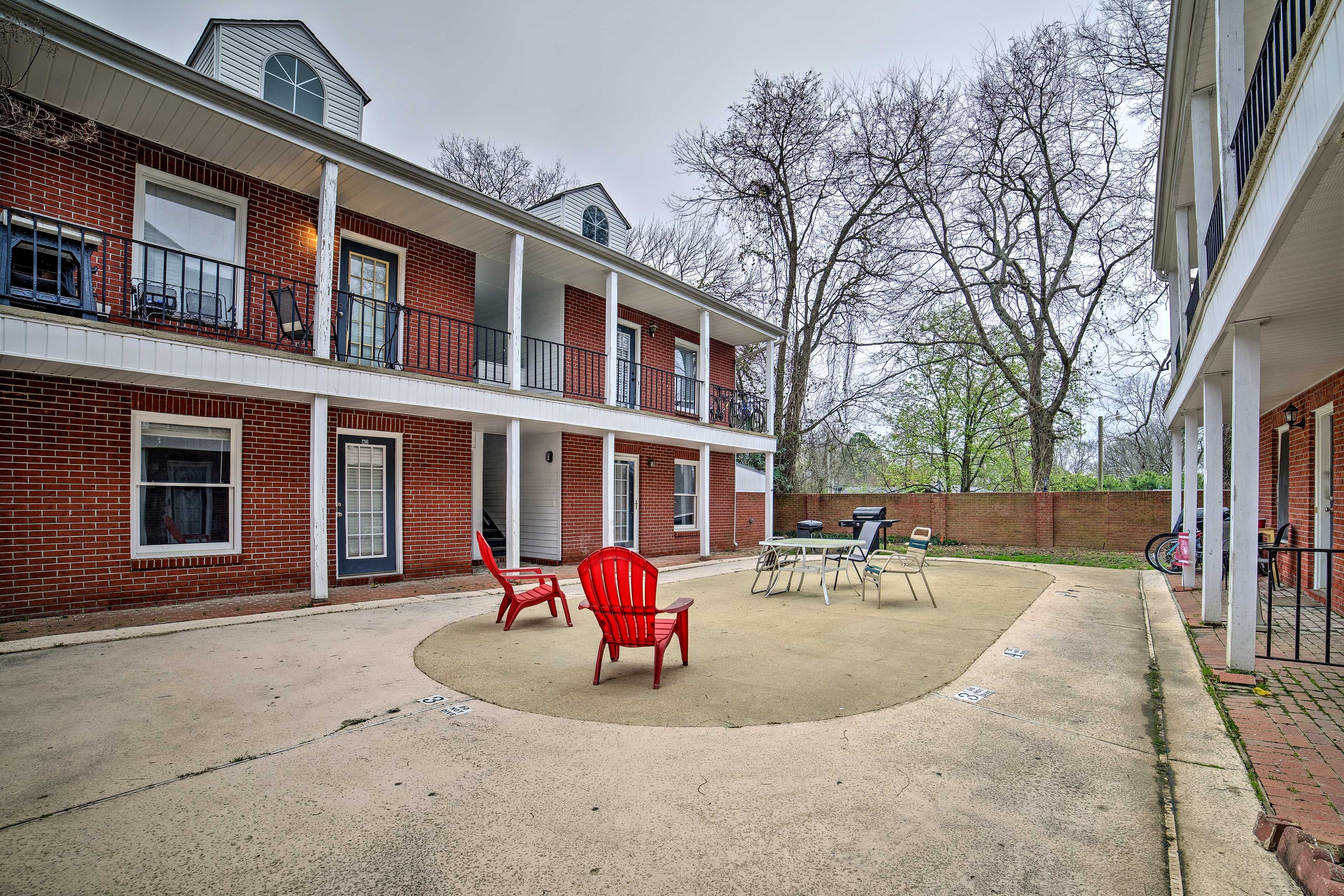 The courtyard features a seating area.