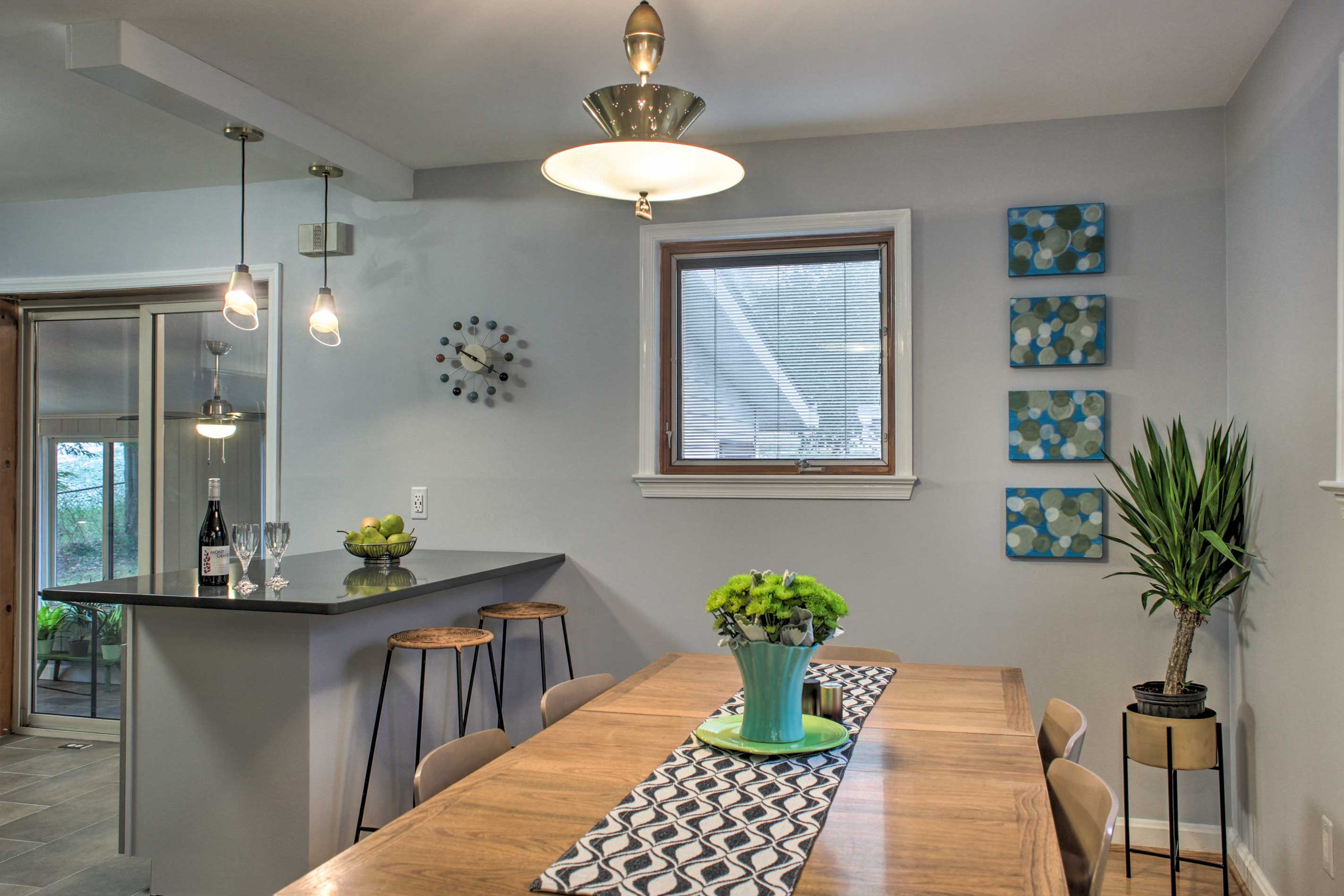 Sit down to dinner at the wooden dining table.