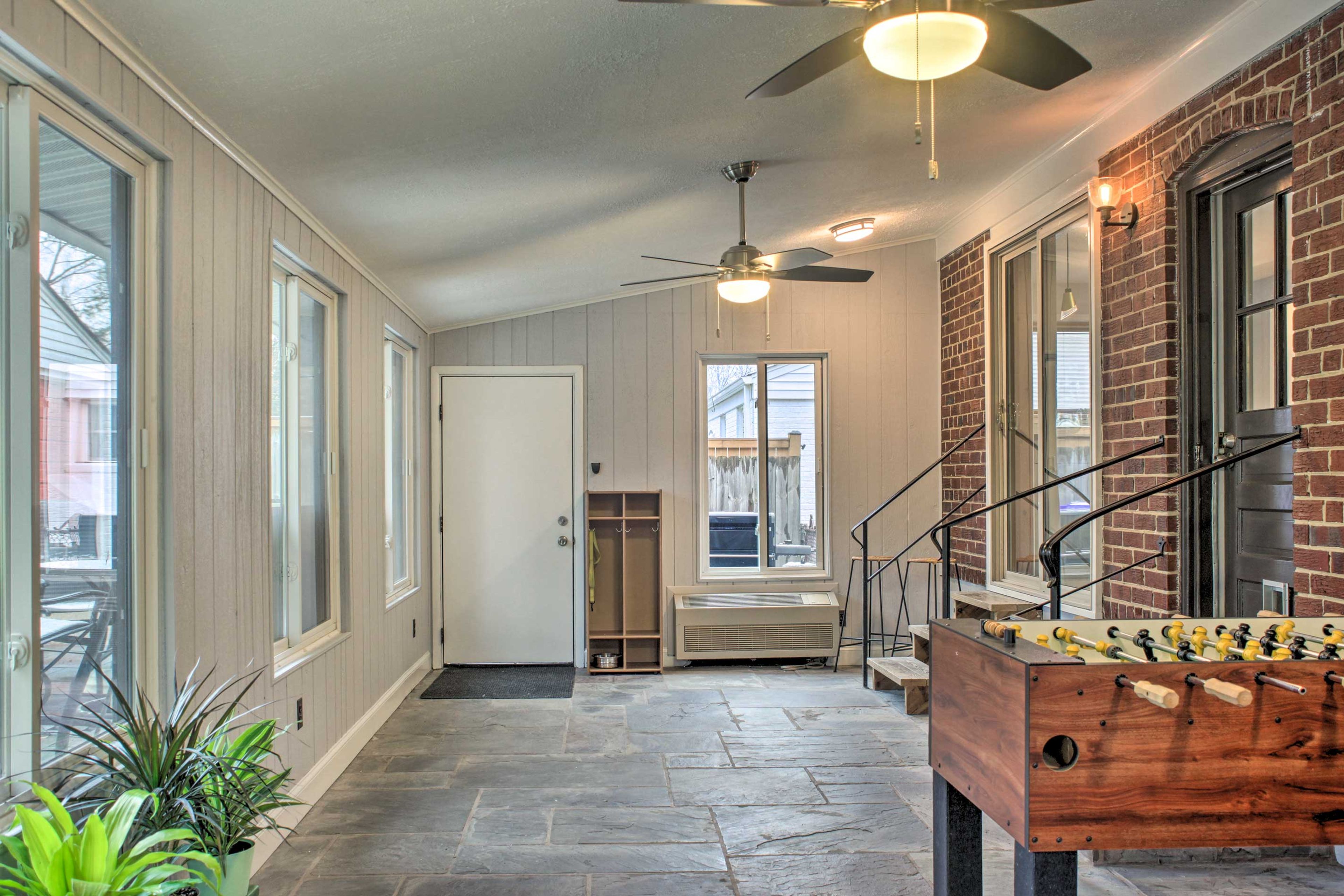 Head onto the sun porch to play a game of foosball.