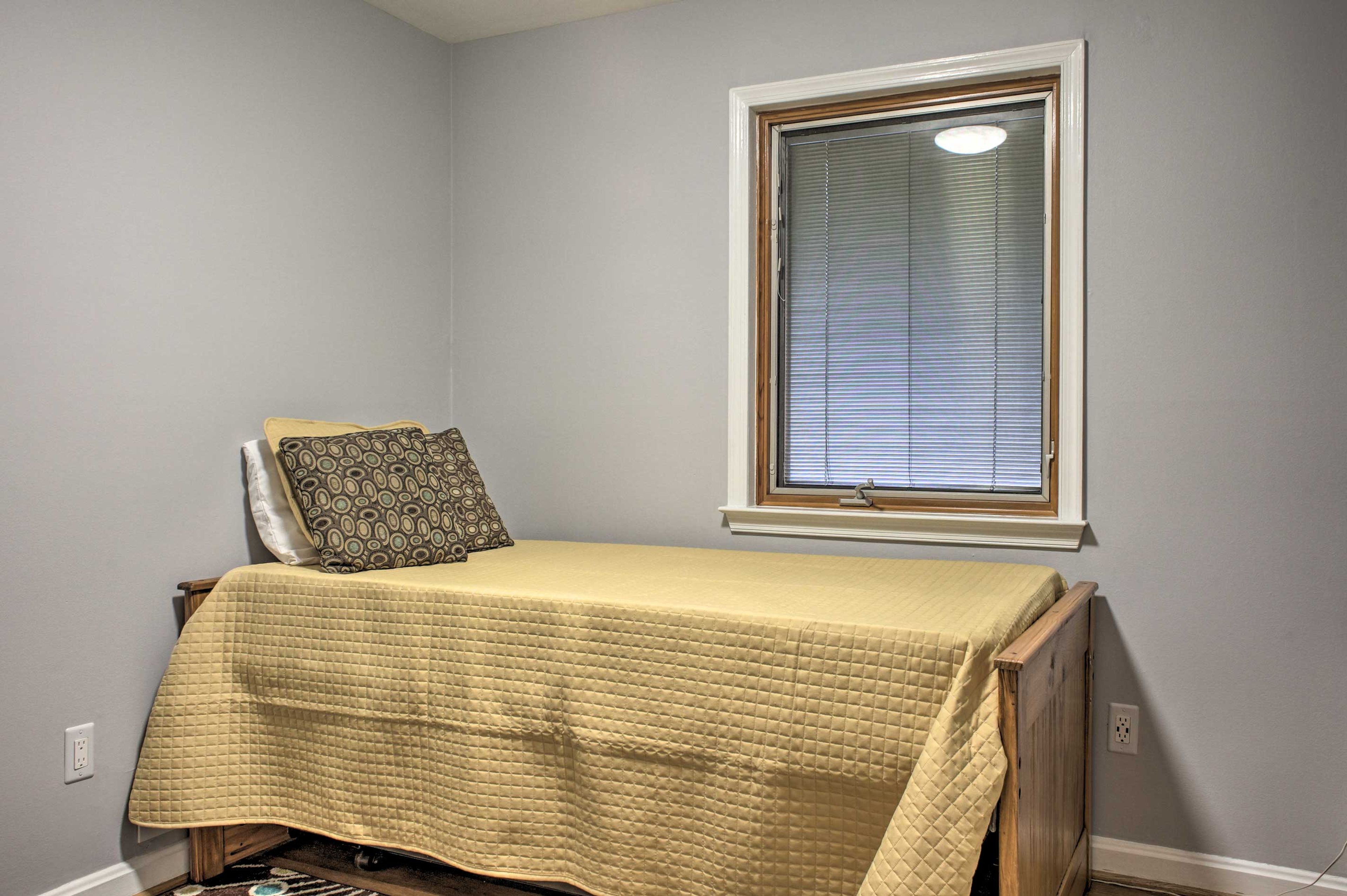 This bedroom has space for 2 in the twin and trundle bed.