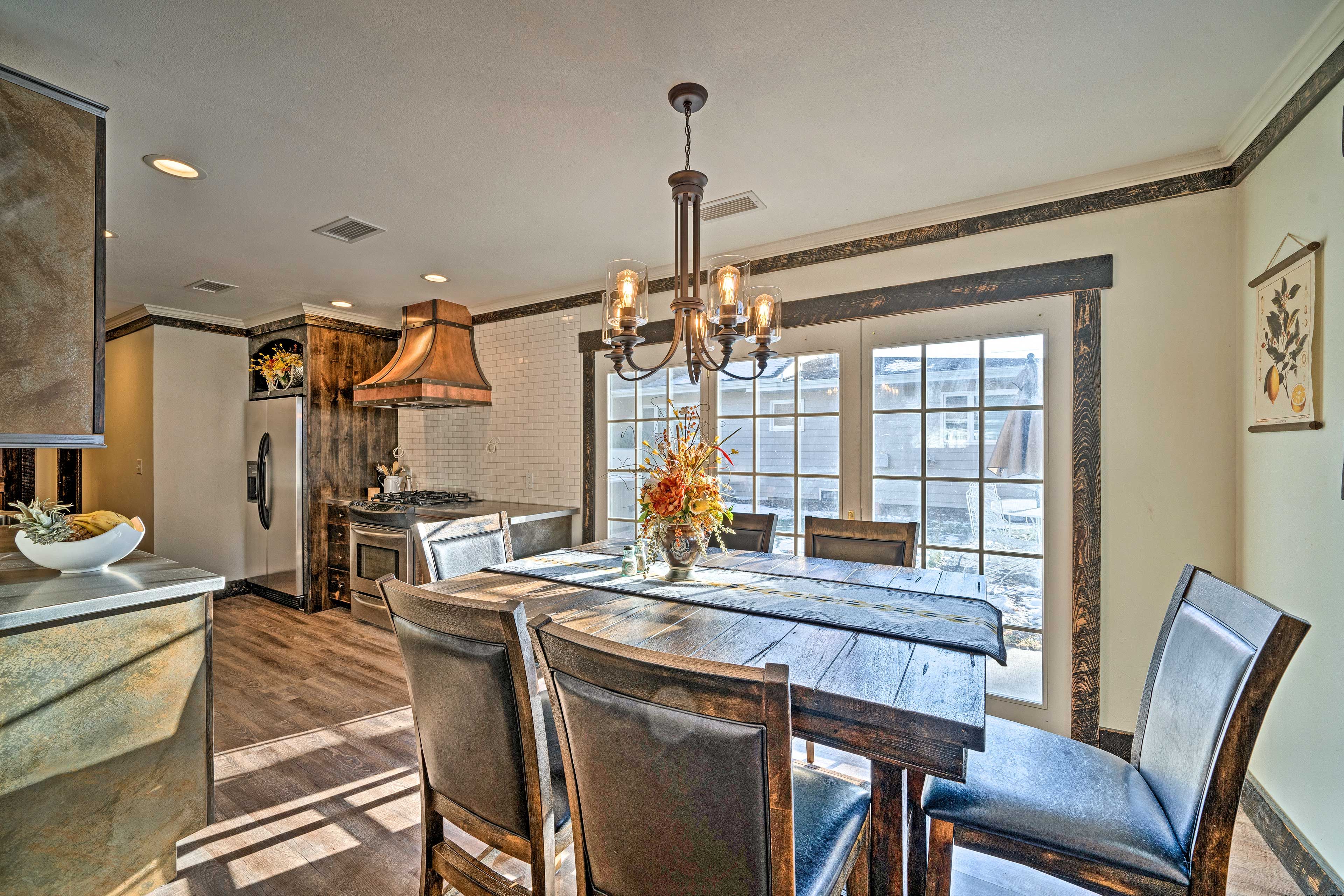 Gather for a meal at the dining table.