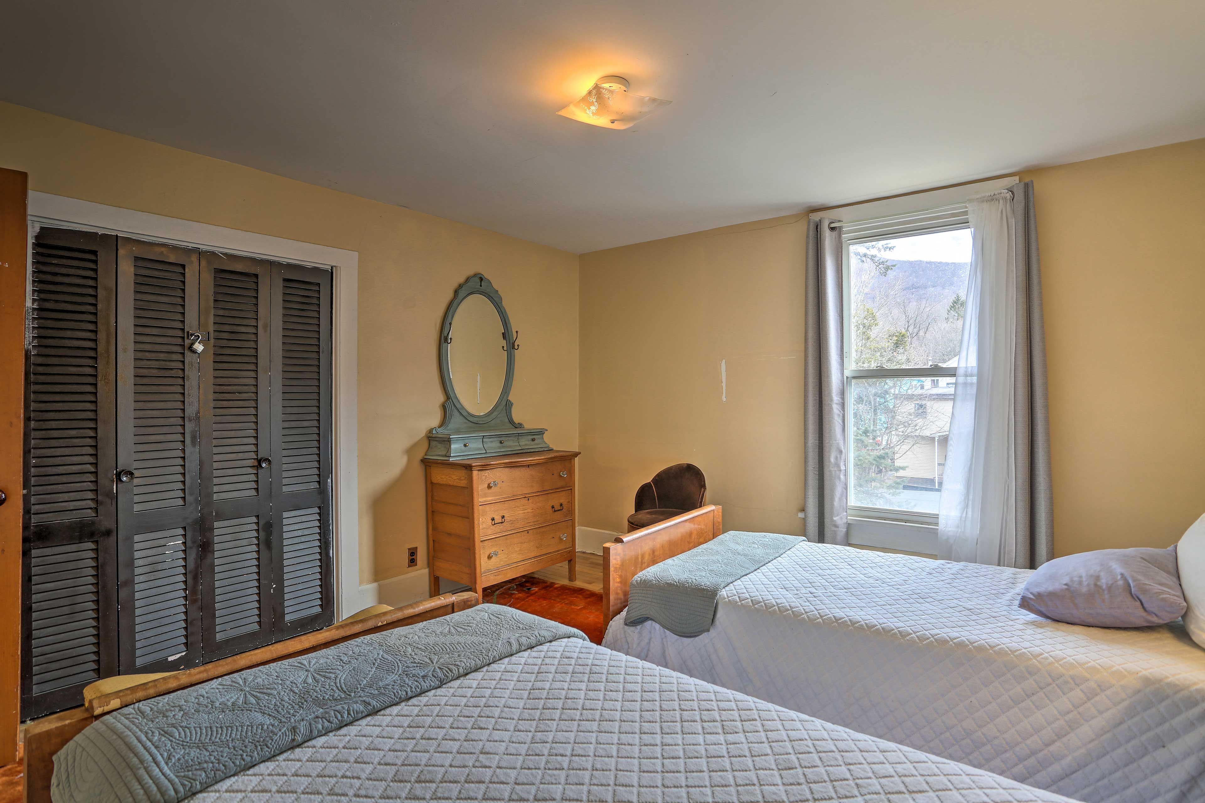 Check out your reflection in the vintage-style dresser!