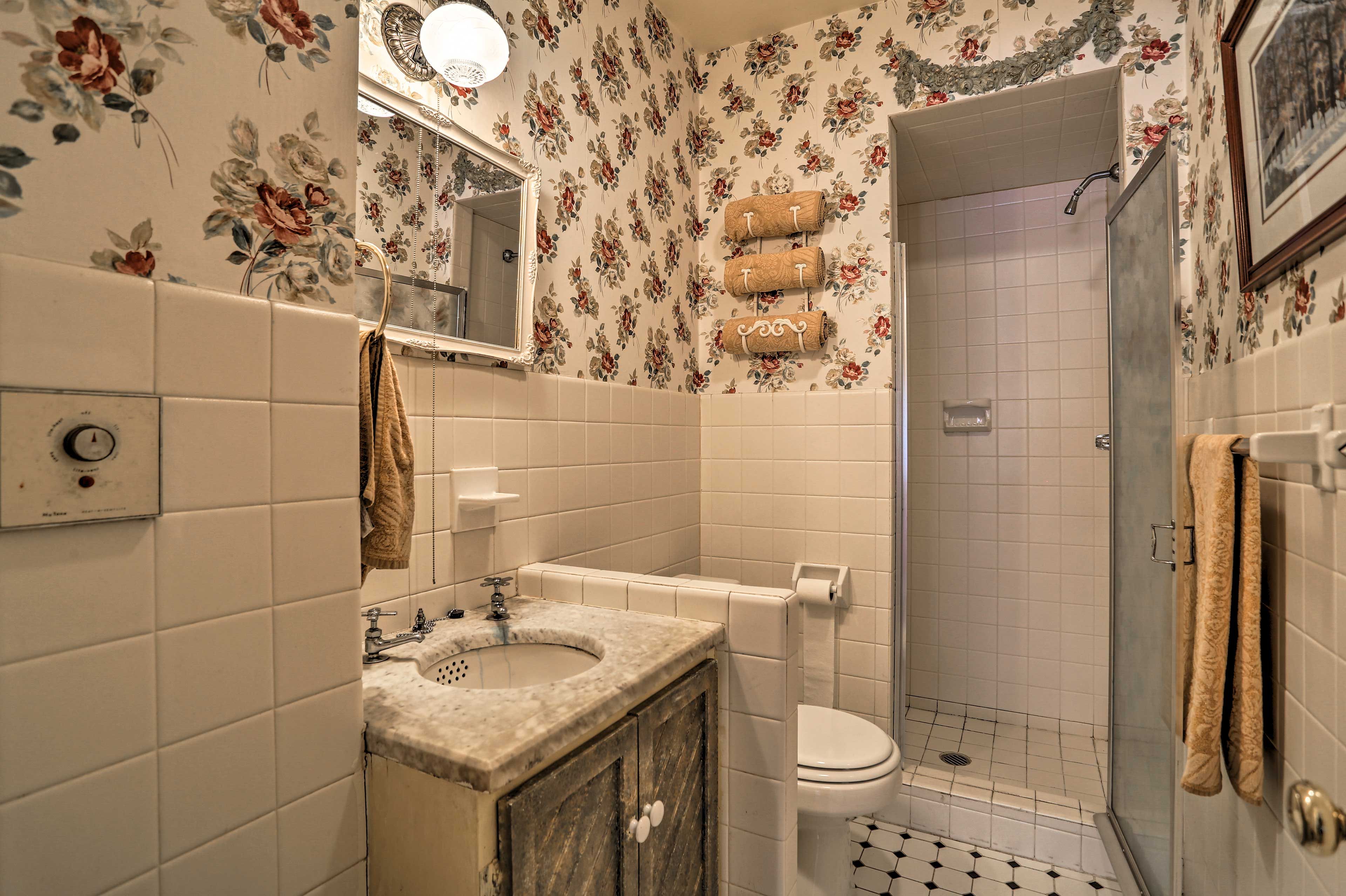 Step into the walk-in shower for a quick rinse in the second bedroom.