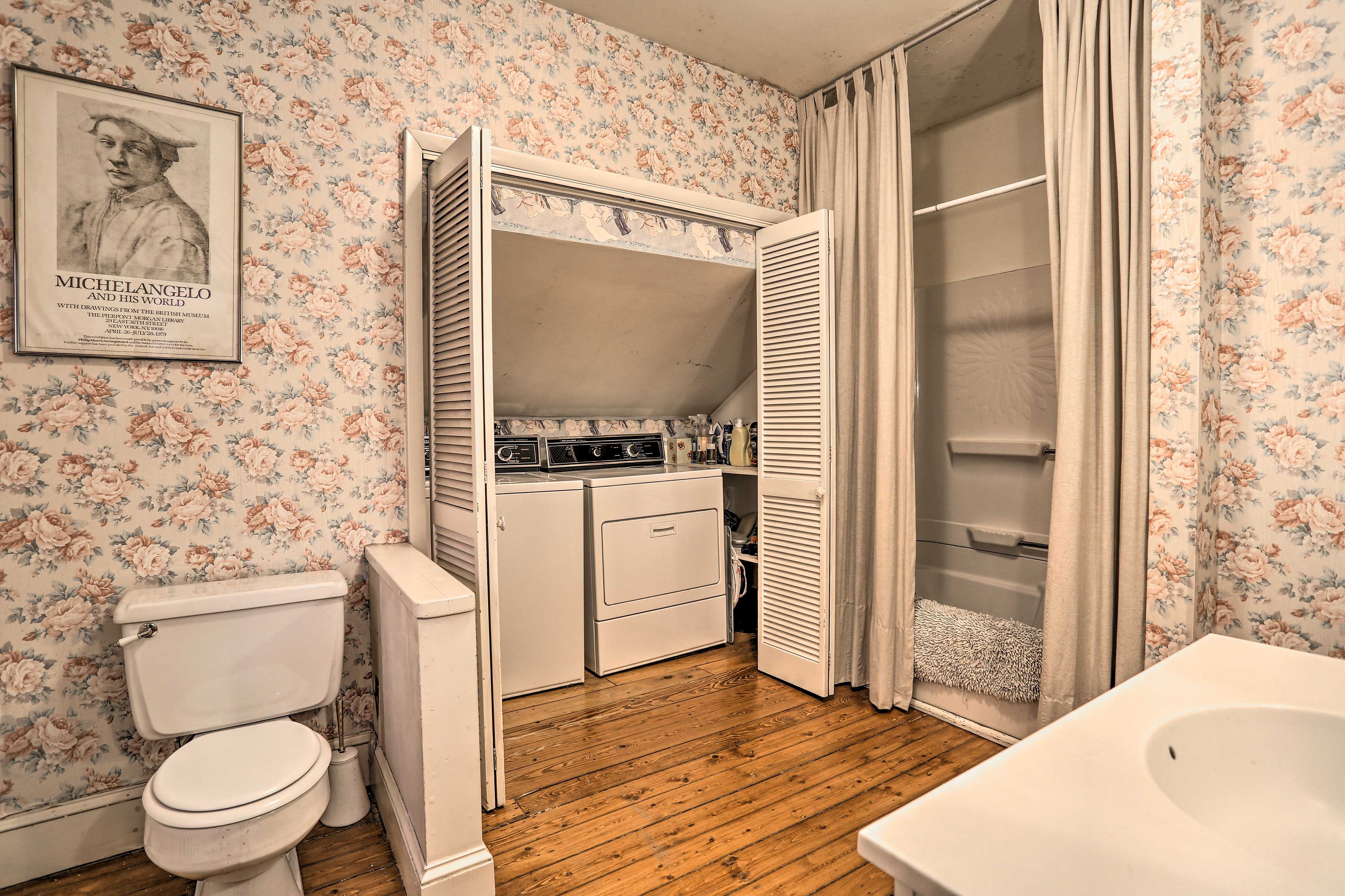 The master bathroom has a shower/tub combo and washer/dryer!