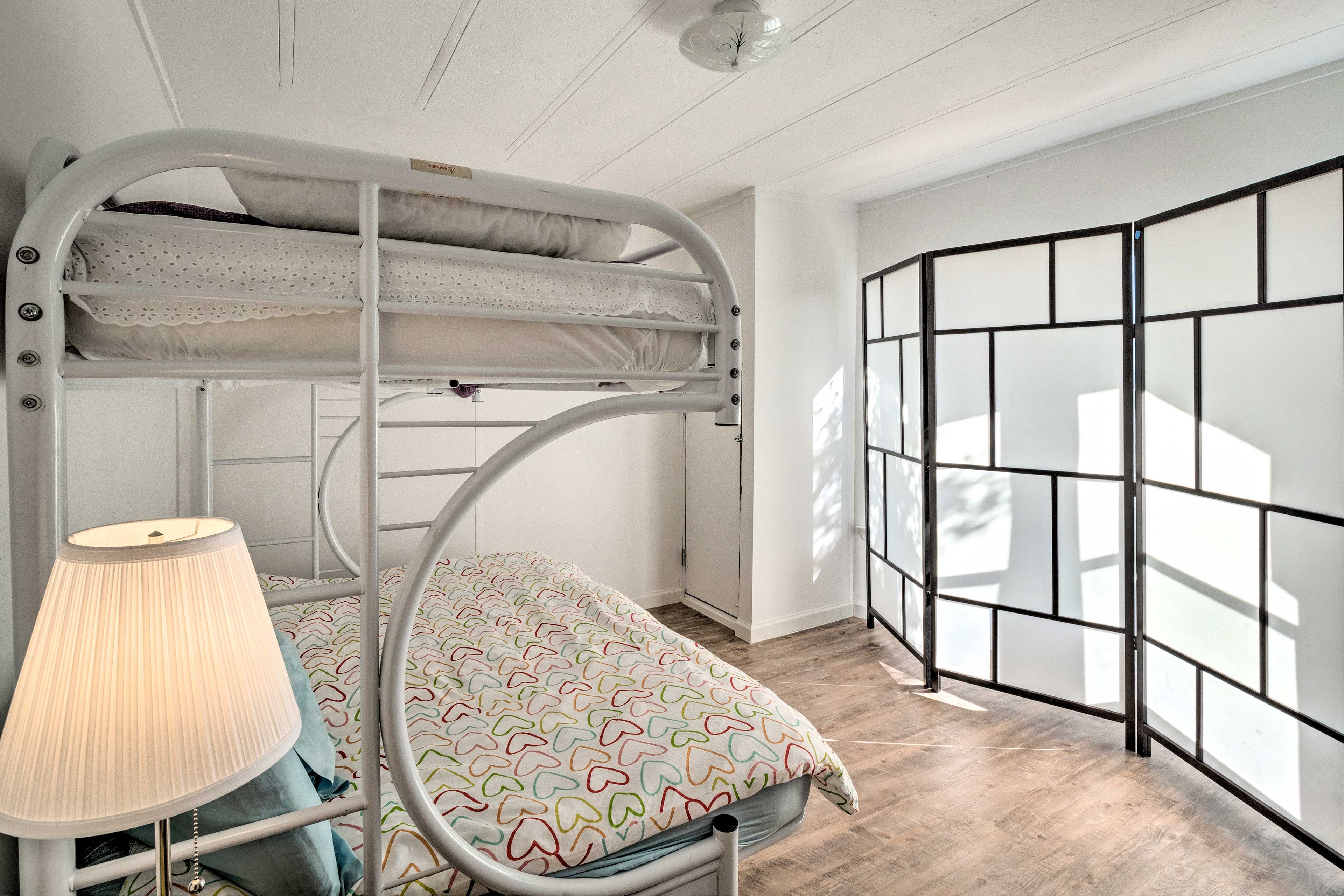 The second bedroom hosts a twin-over-full bunk bed.