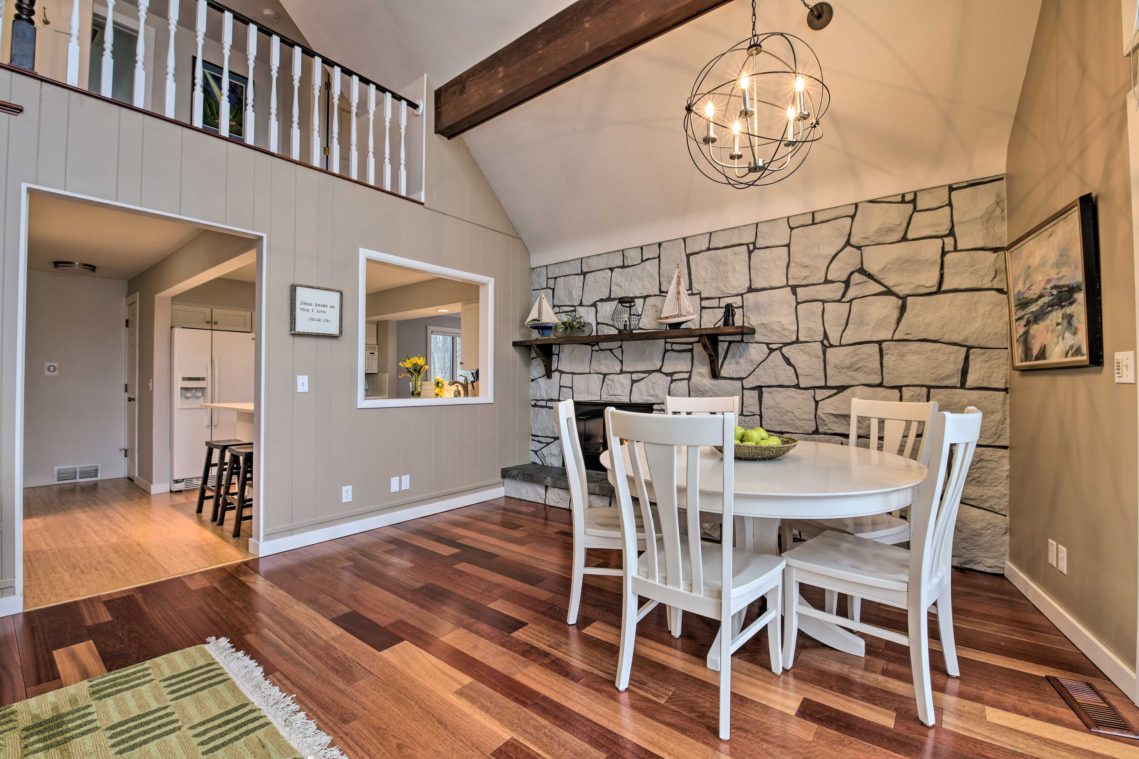 The dining area has seating for 5 guests.