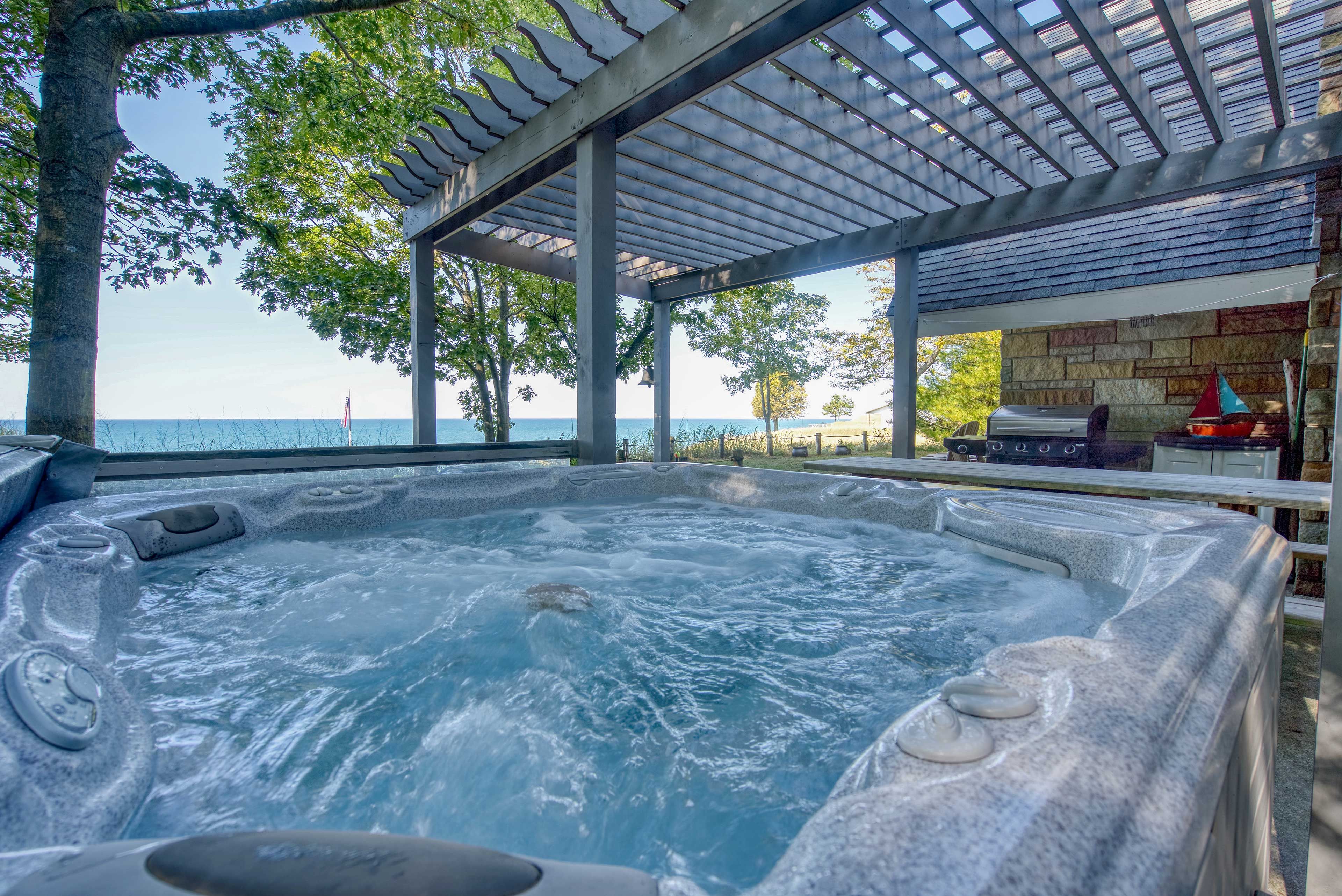 The hot tub overlooks scenic views.