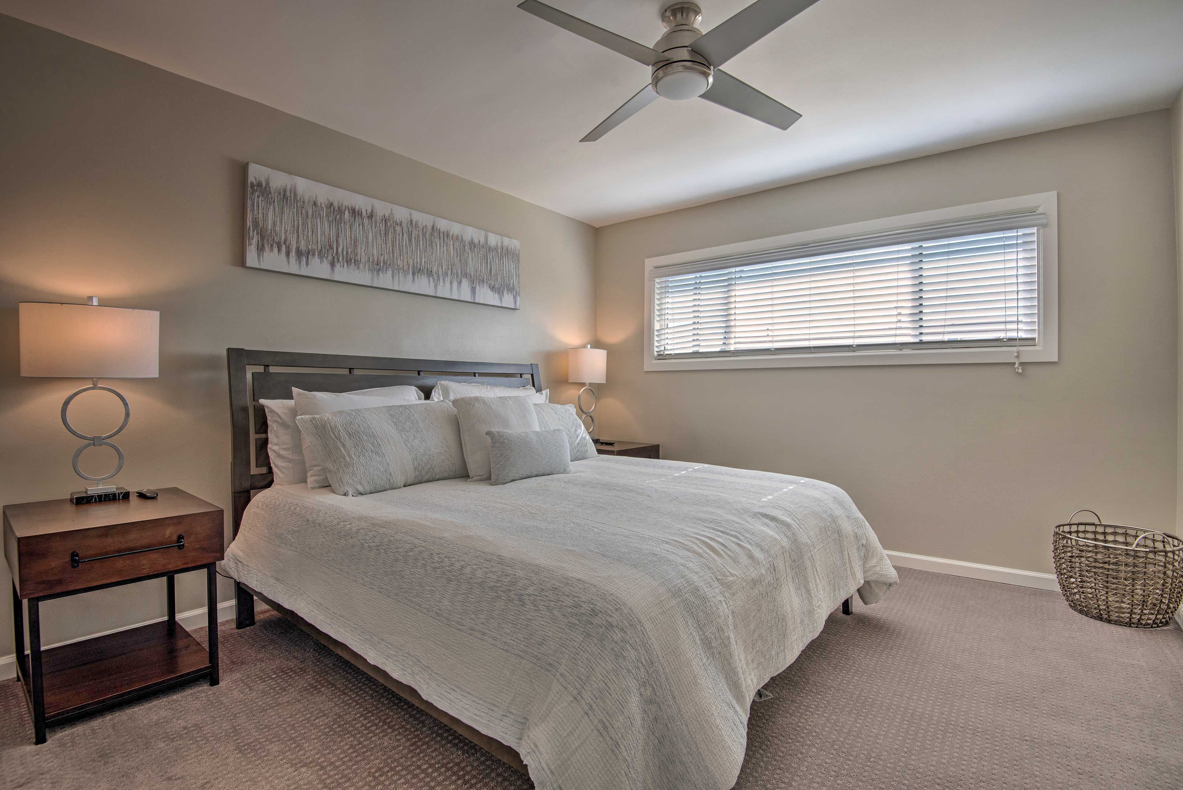 This first bedroom is home to a king bed perfect for accommodating two guests.