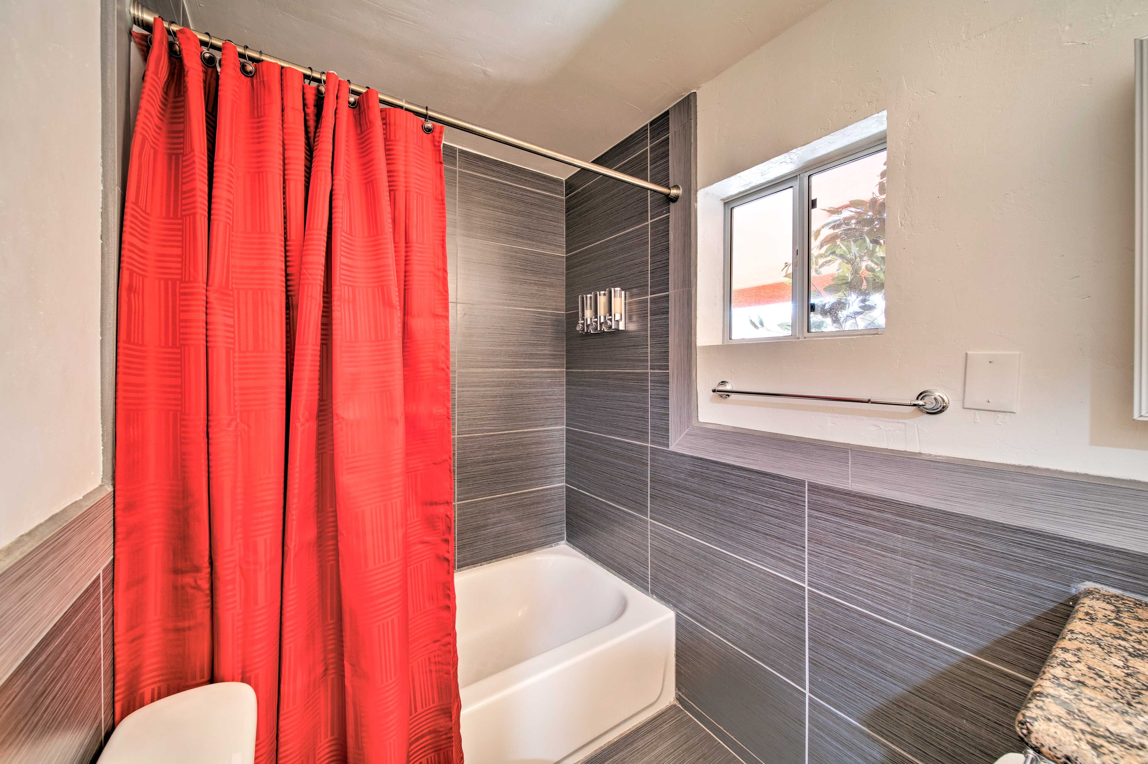 Enjoy an evening bath in the shower/tub combo.