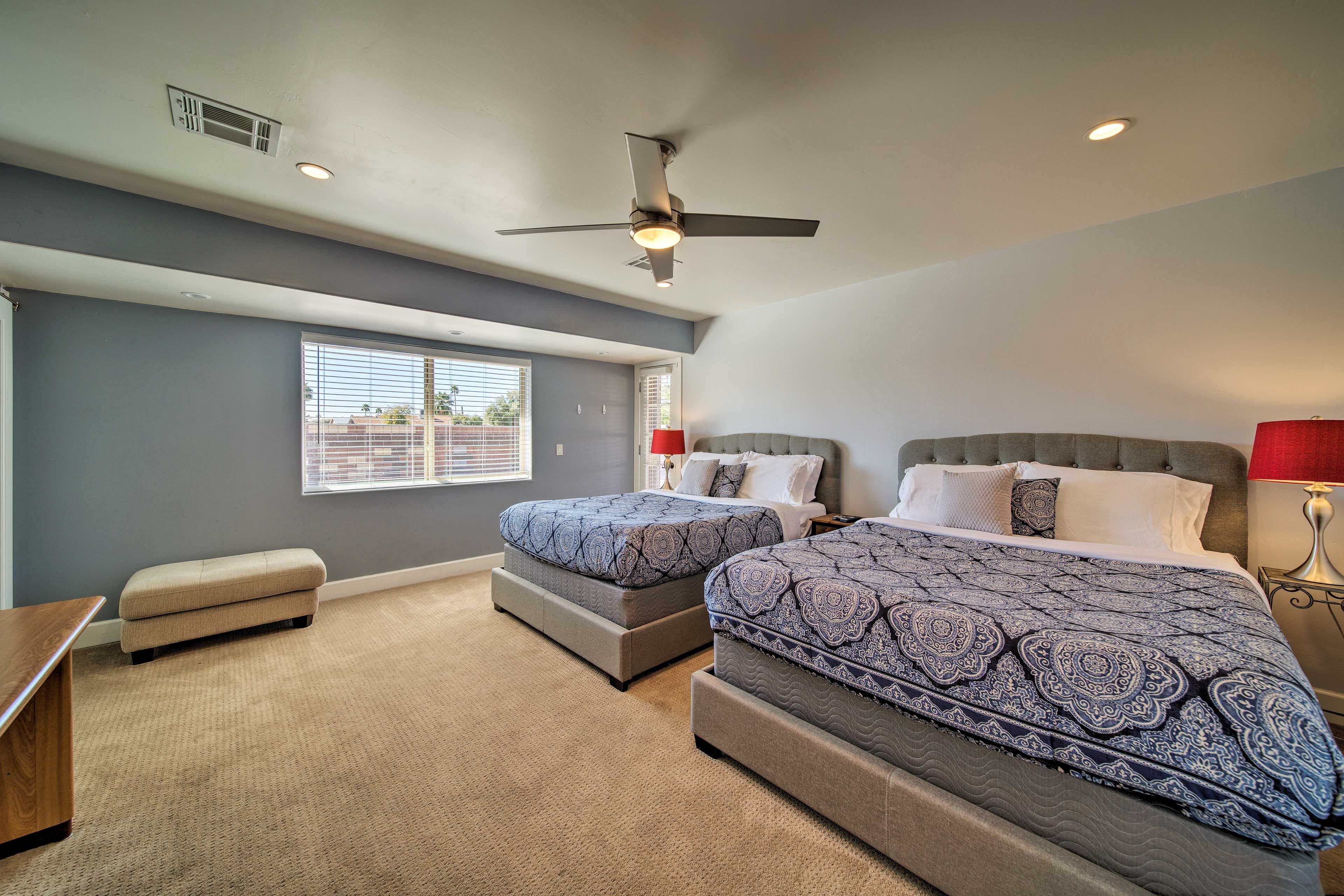 Four will sleep soundly in this bedroom with 2 queen beds.
