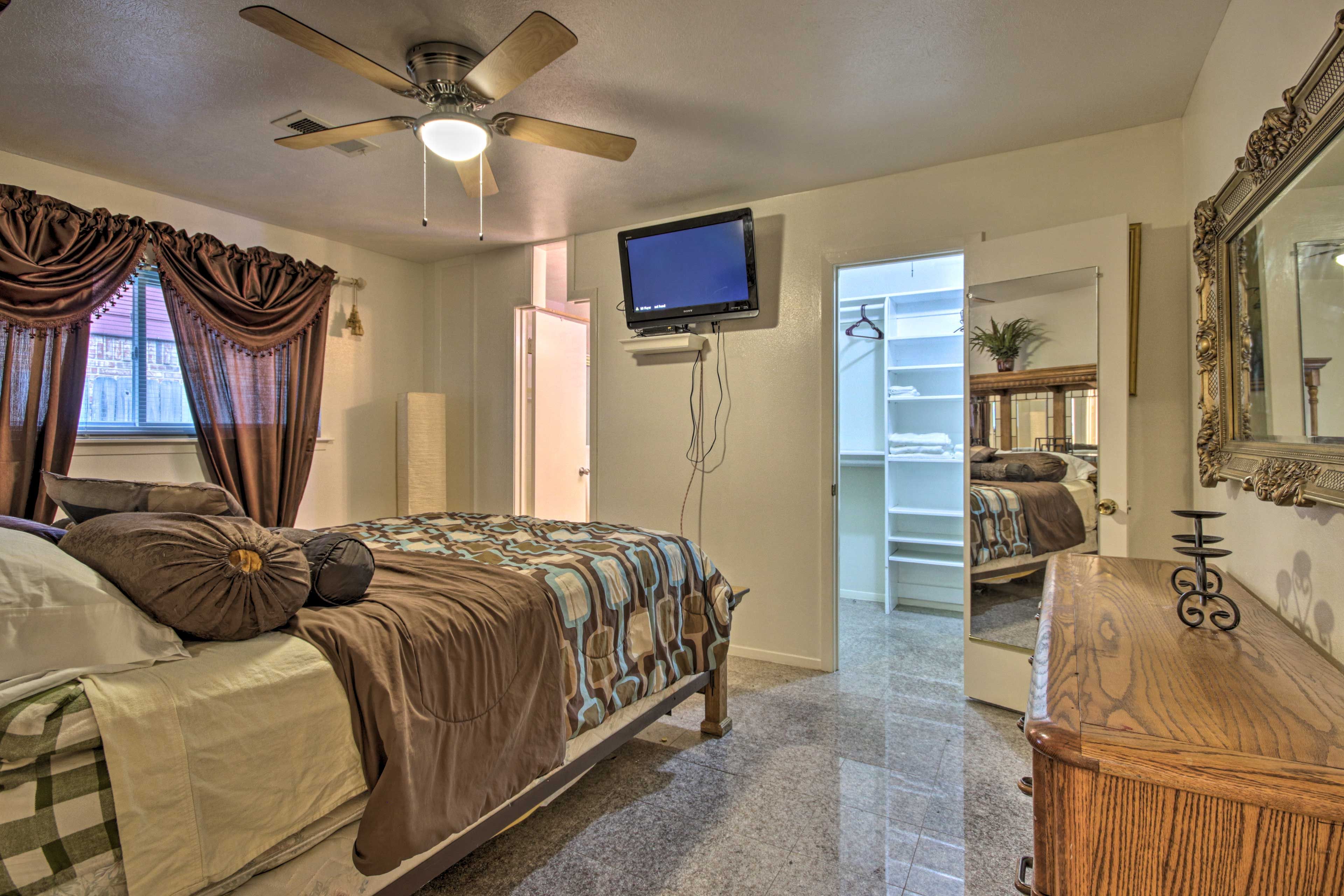 The main bedroom has a walk-in closet and flat-screen TV!