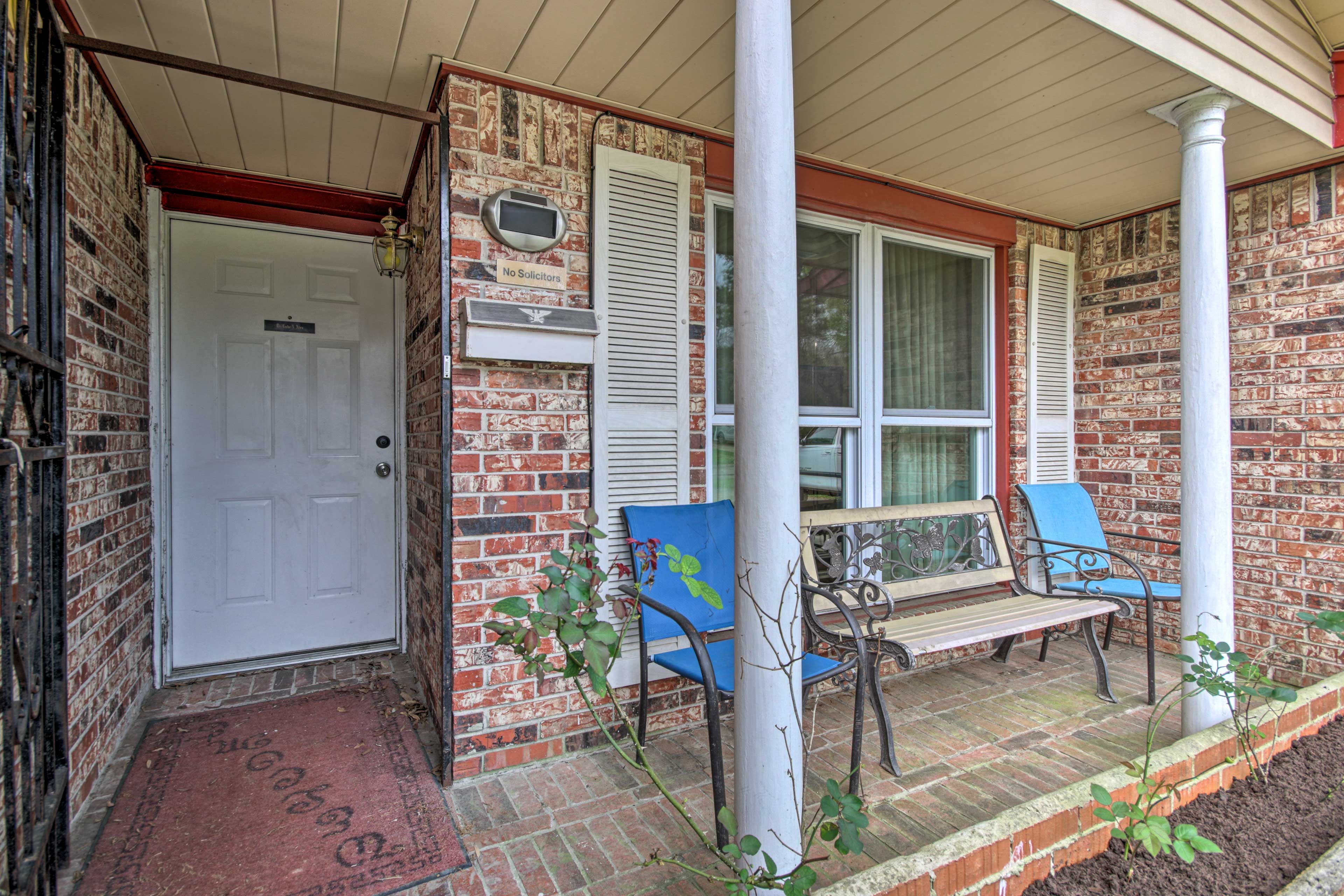 Sit on the covered front porch and watch the world go by.