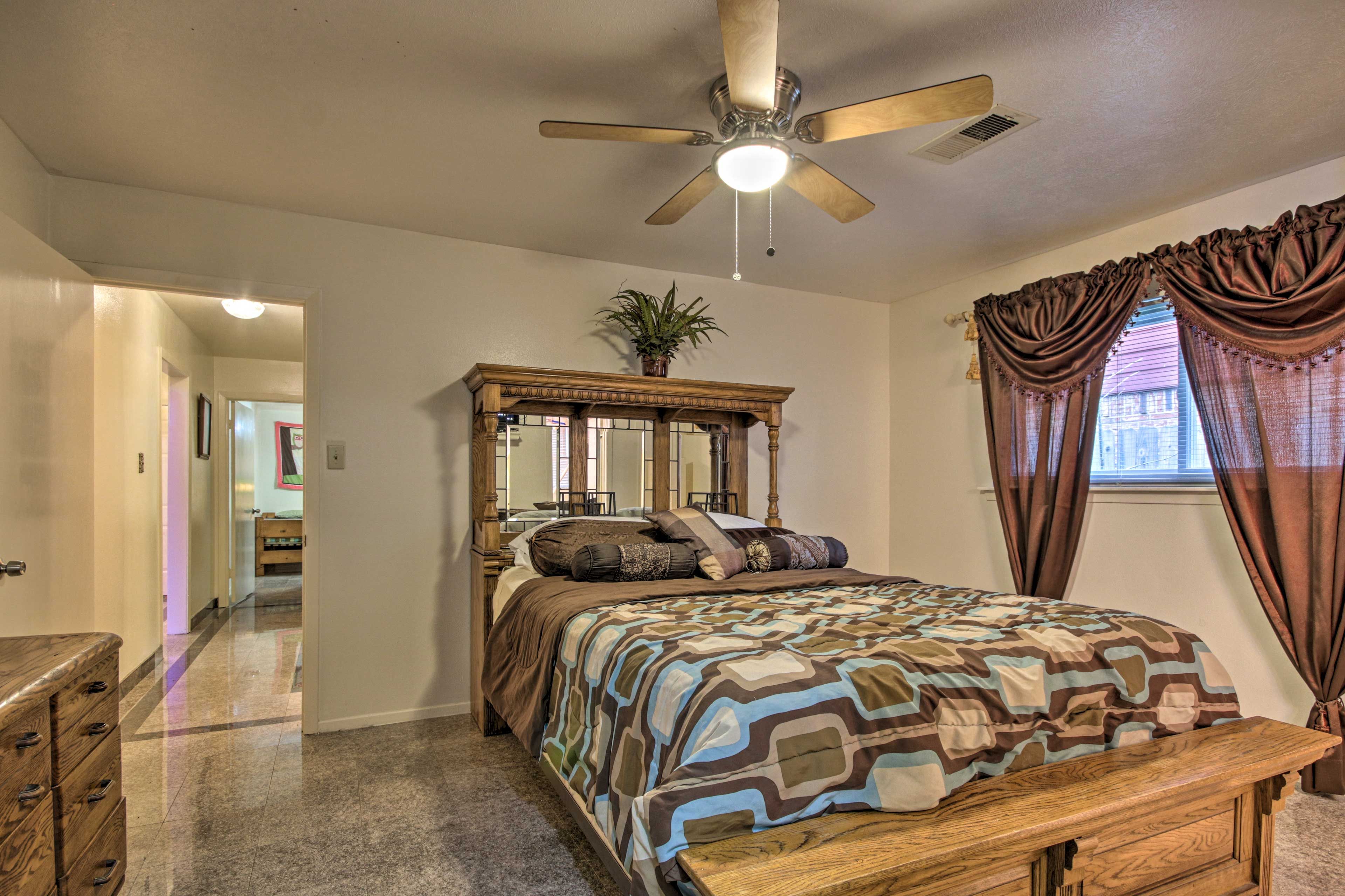 Unwind after the day's events on the Queen-sized bed.