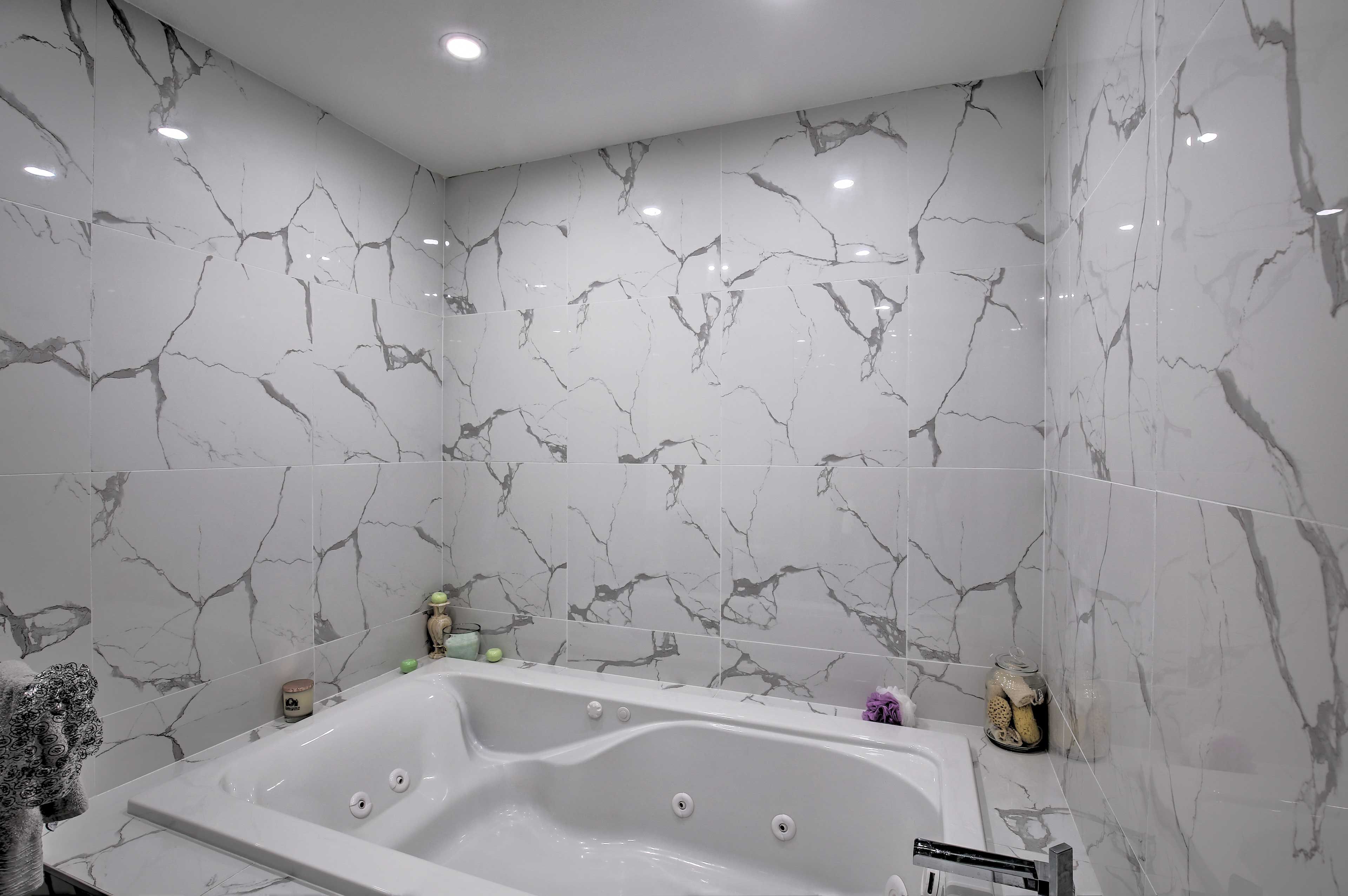 Treat yourself to a long soak in the jetted bathtub.