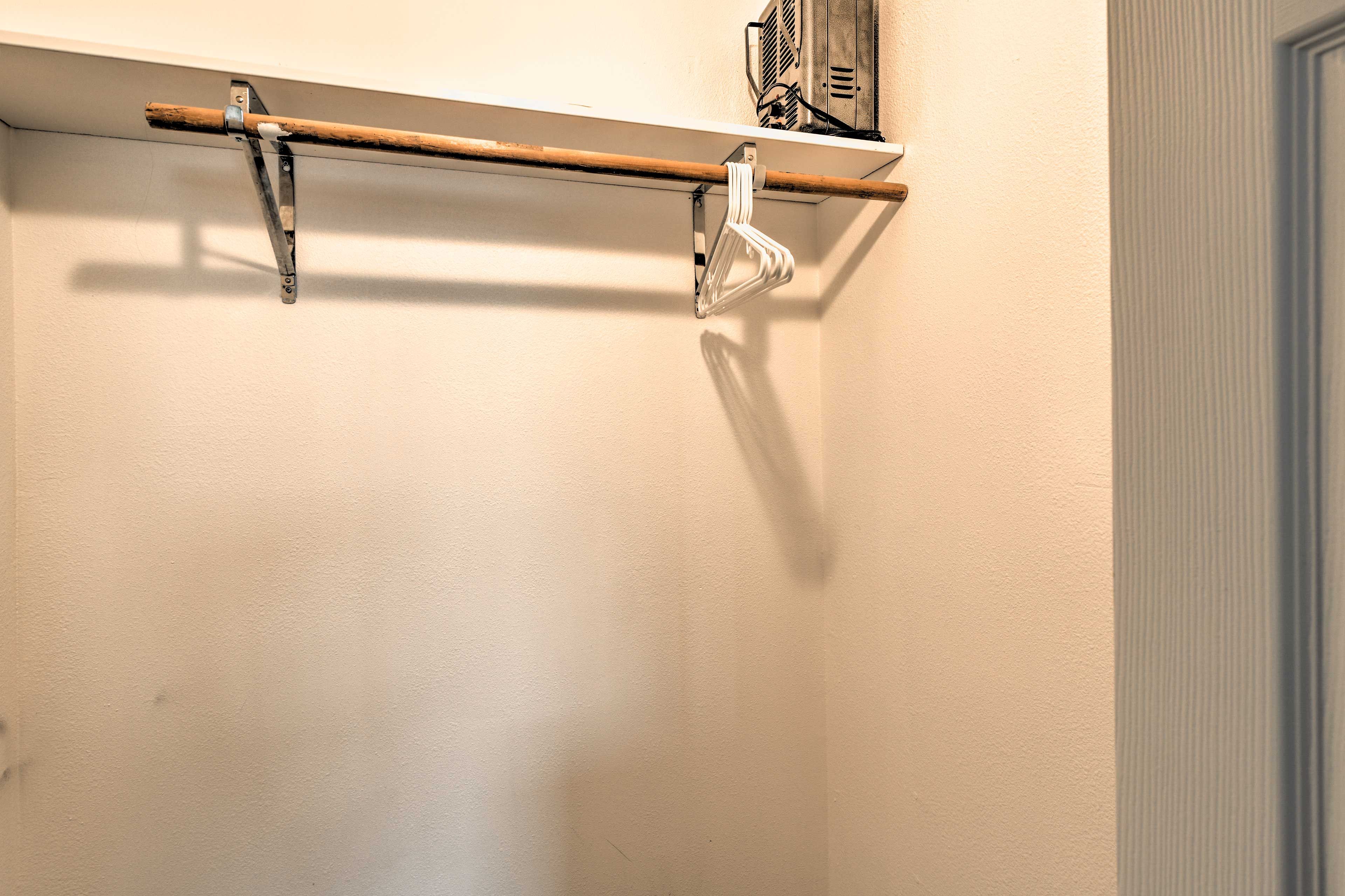 Hang your clothes in the folding-door closet!