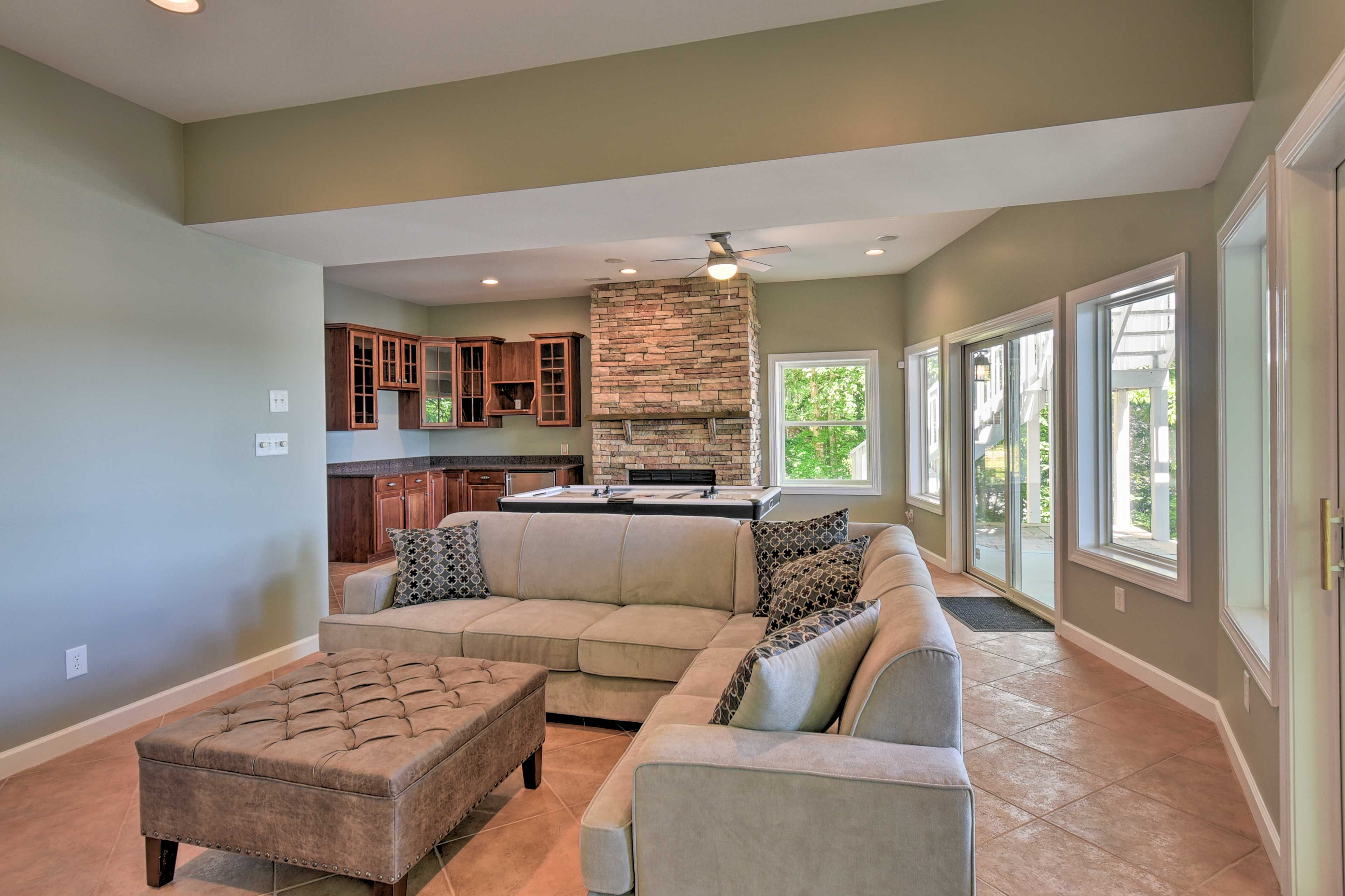 Multiple living spaces make the home great for large families.