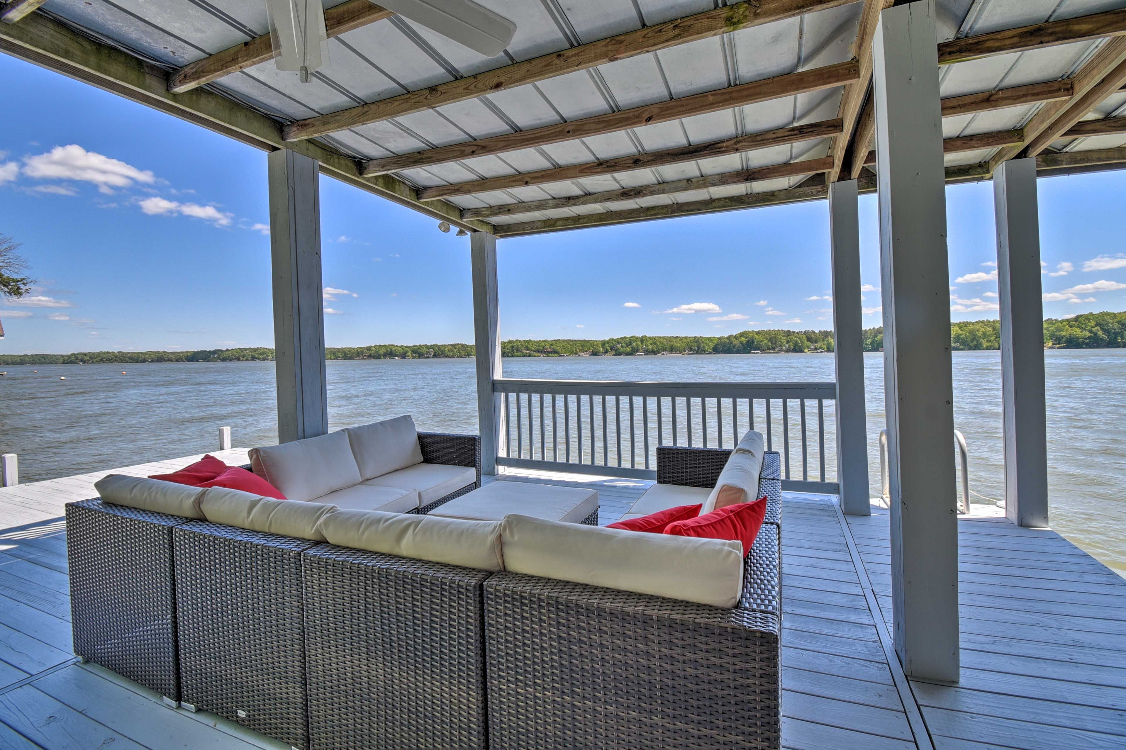 This vacation rental has a private dock and sits right on Lake Gaston.