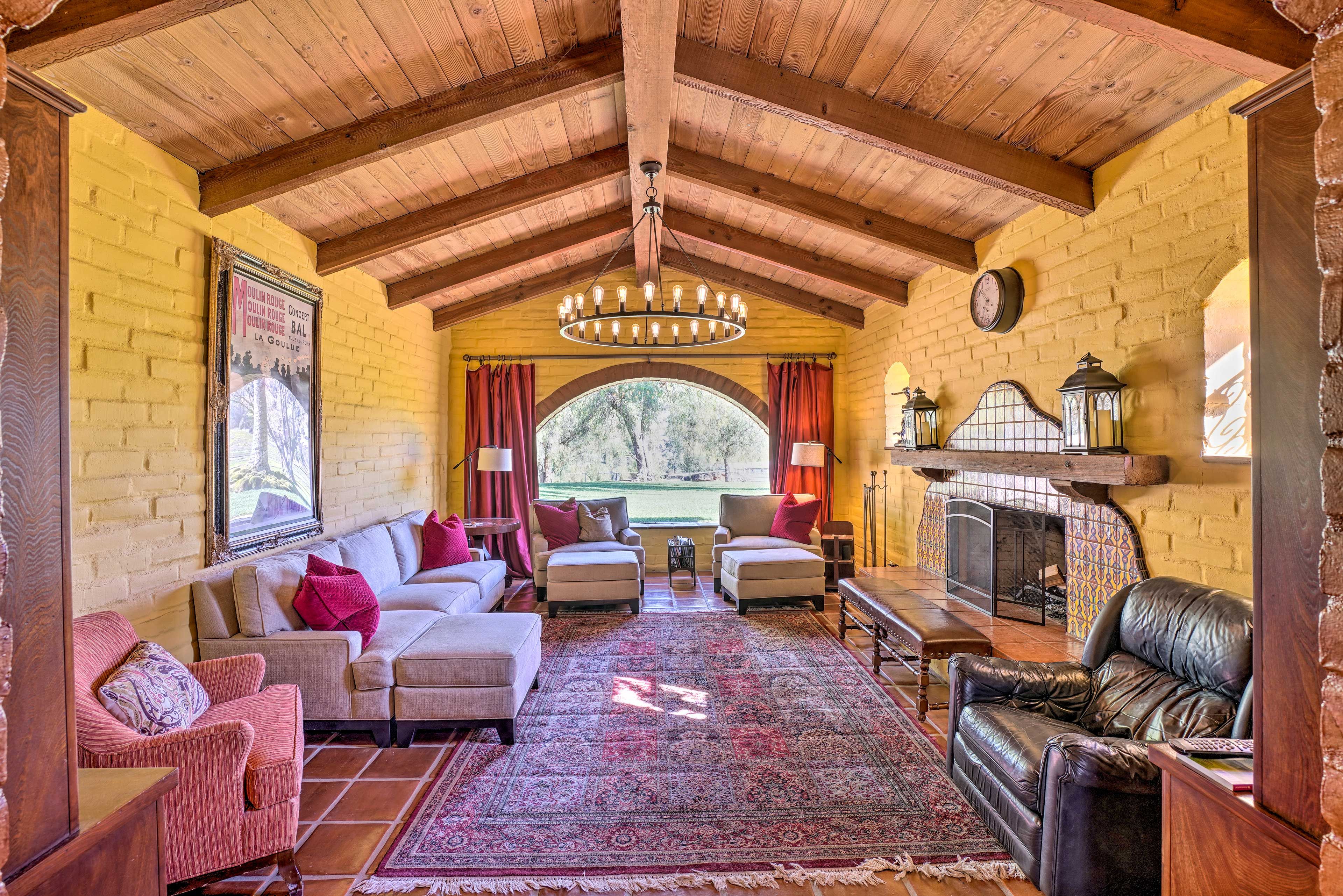 This whimsical living room is tailor-made for reading by the crackling fire.