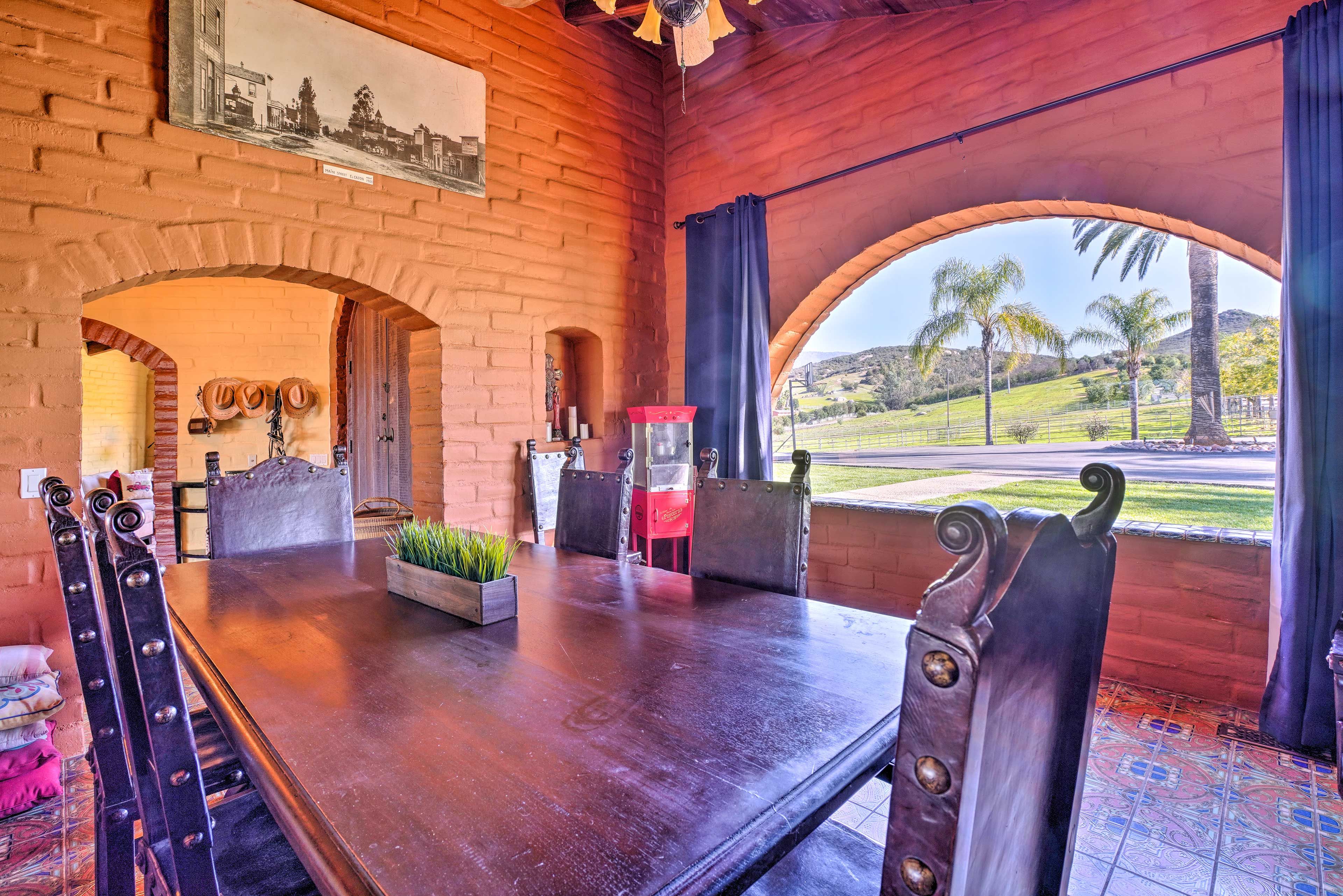 Gather around the formal dining table for an elegant home-cooked meal.