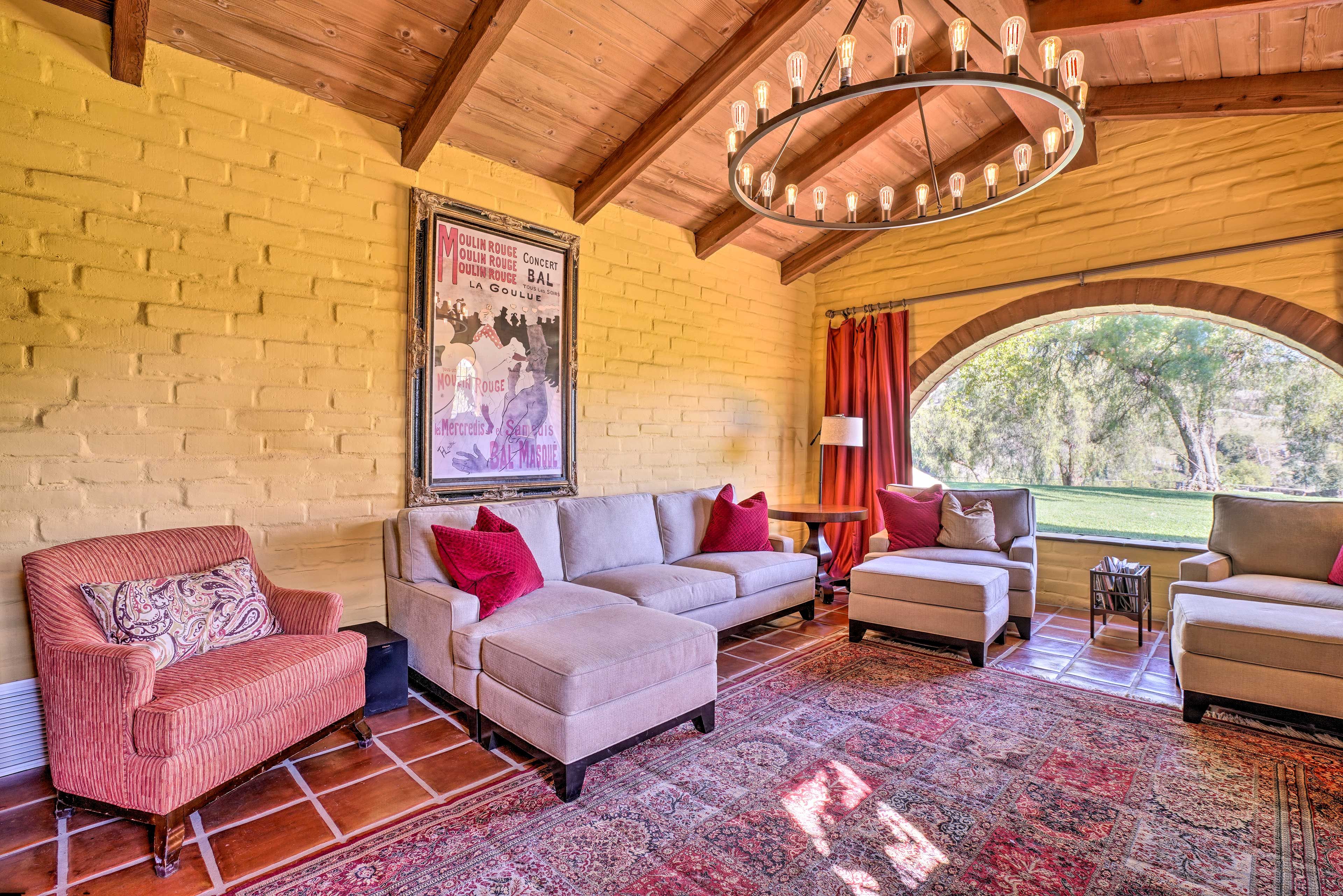 Large windows allow natural light to illuminate the living space.