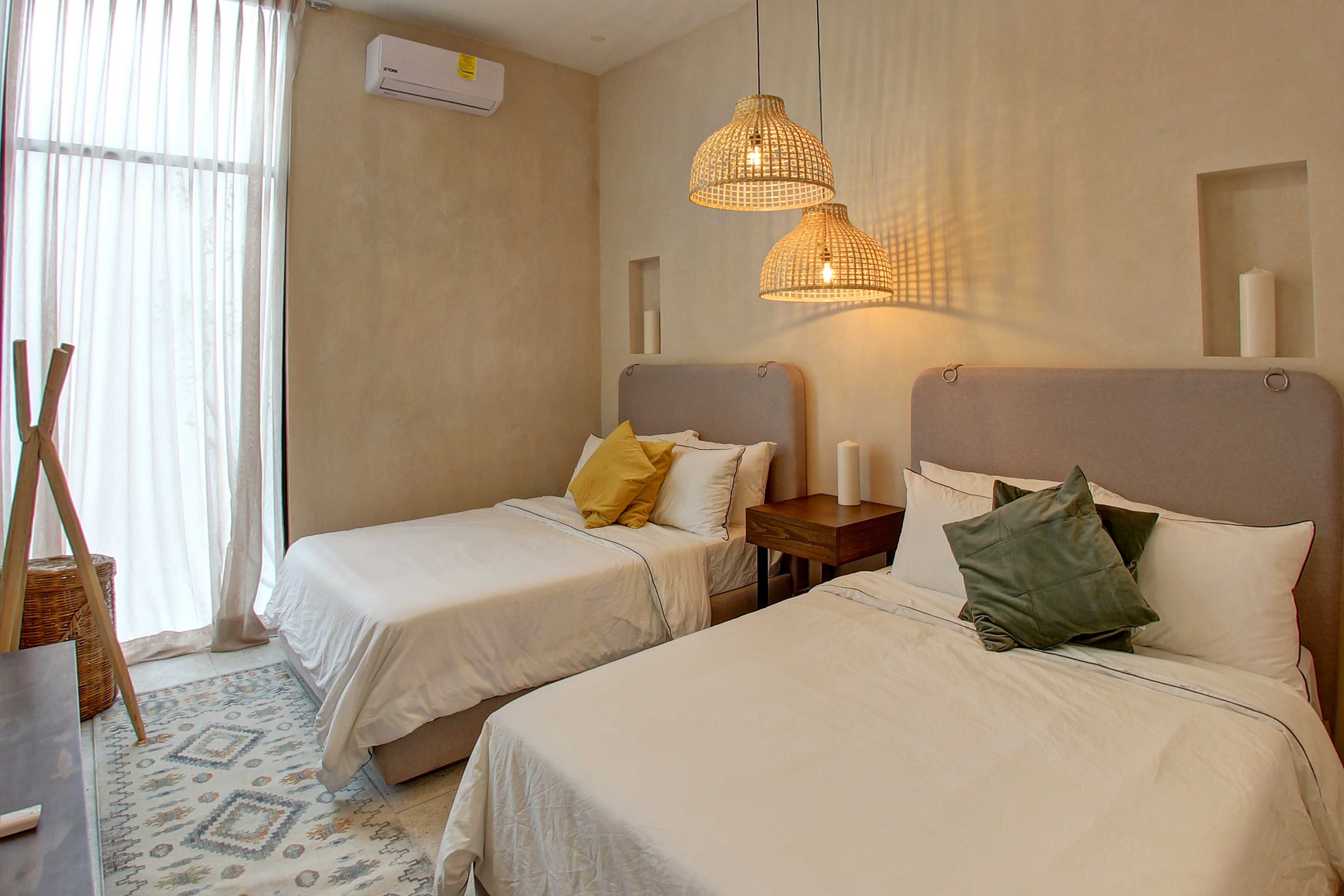 Take your pick of 2 queen-sized beds in this spacious room.