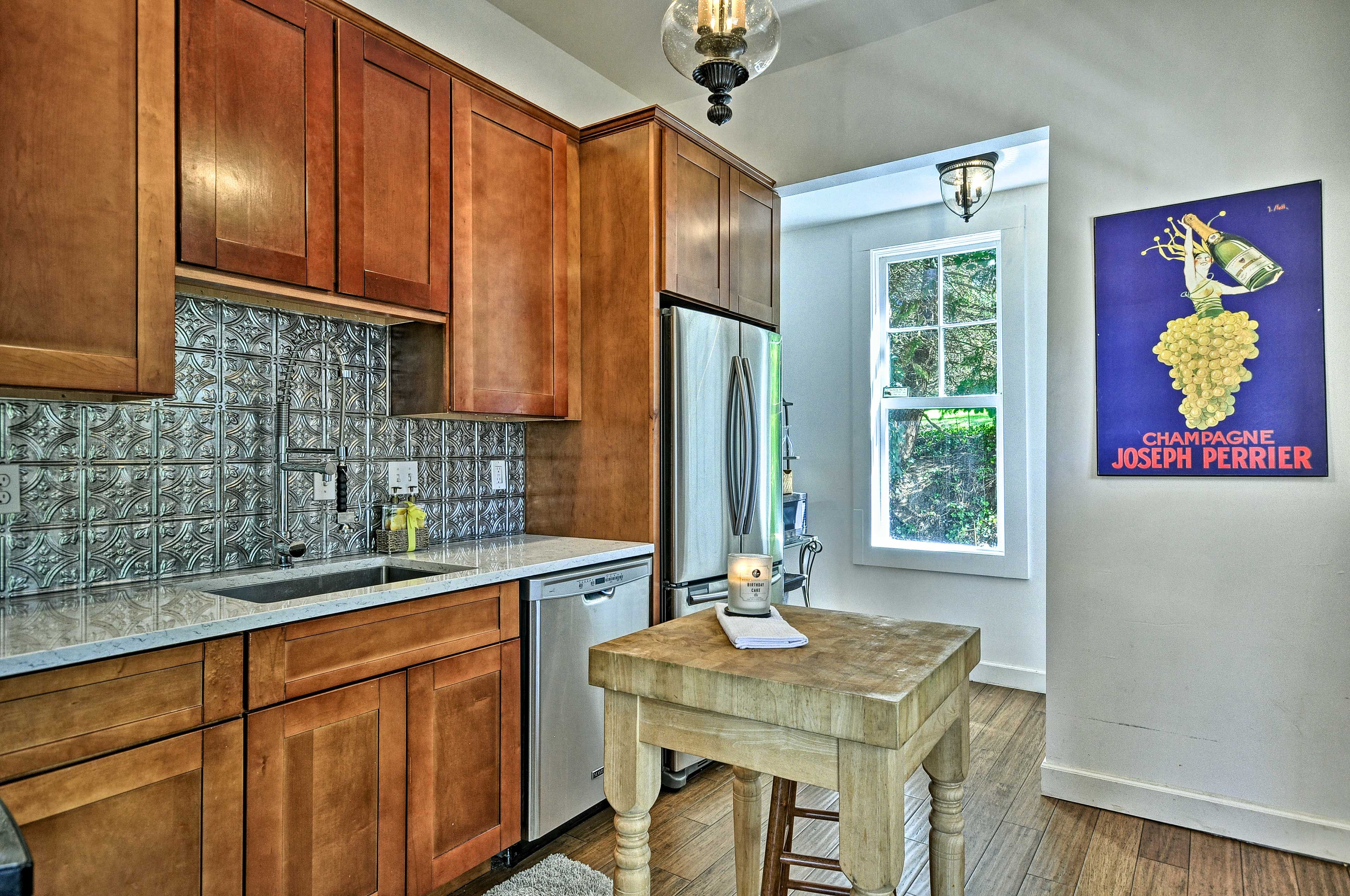 Prep your meals on this butcher block island.