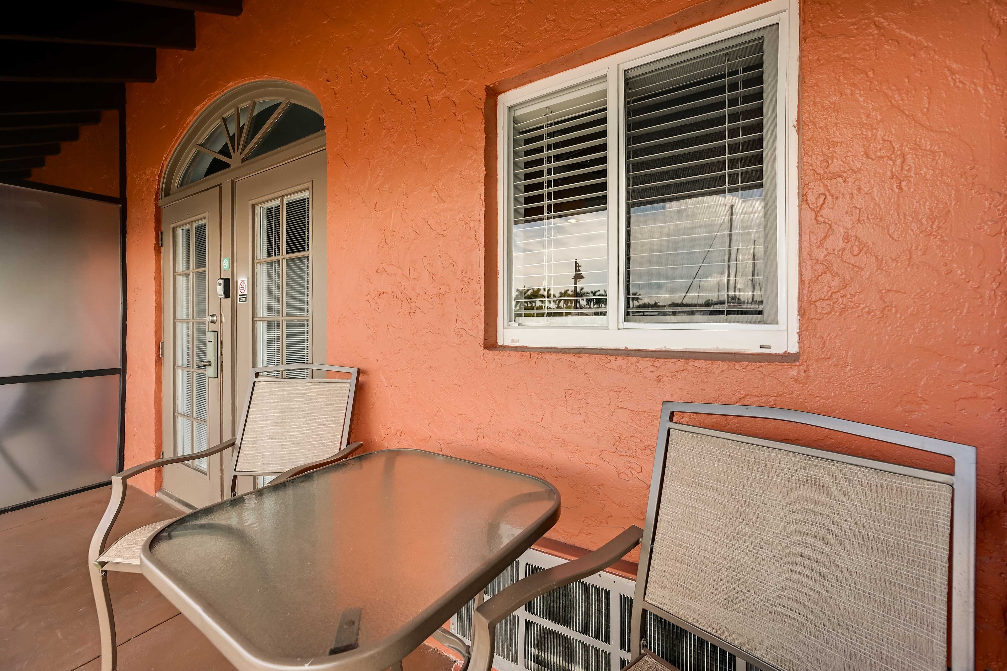 Screened Porch | Outdoor Dining | Marina Views