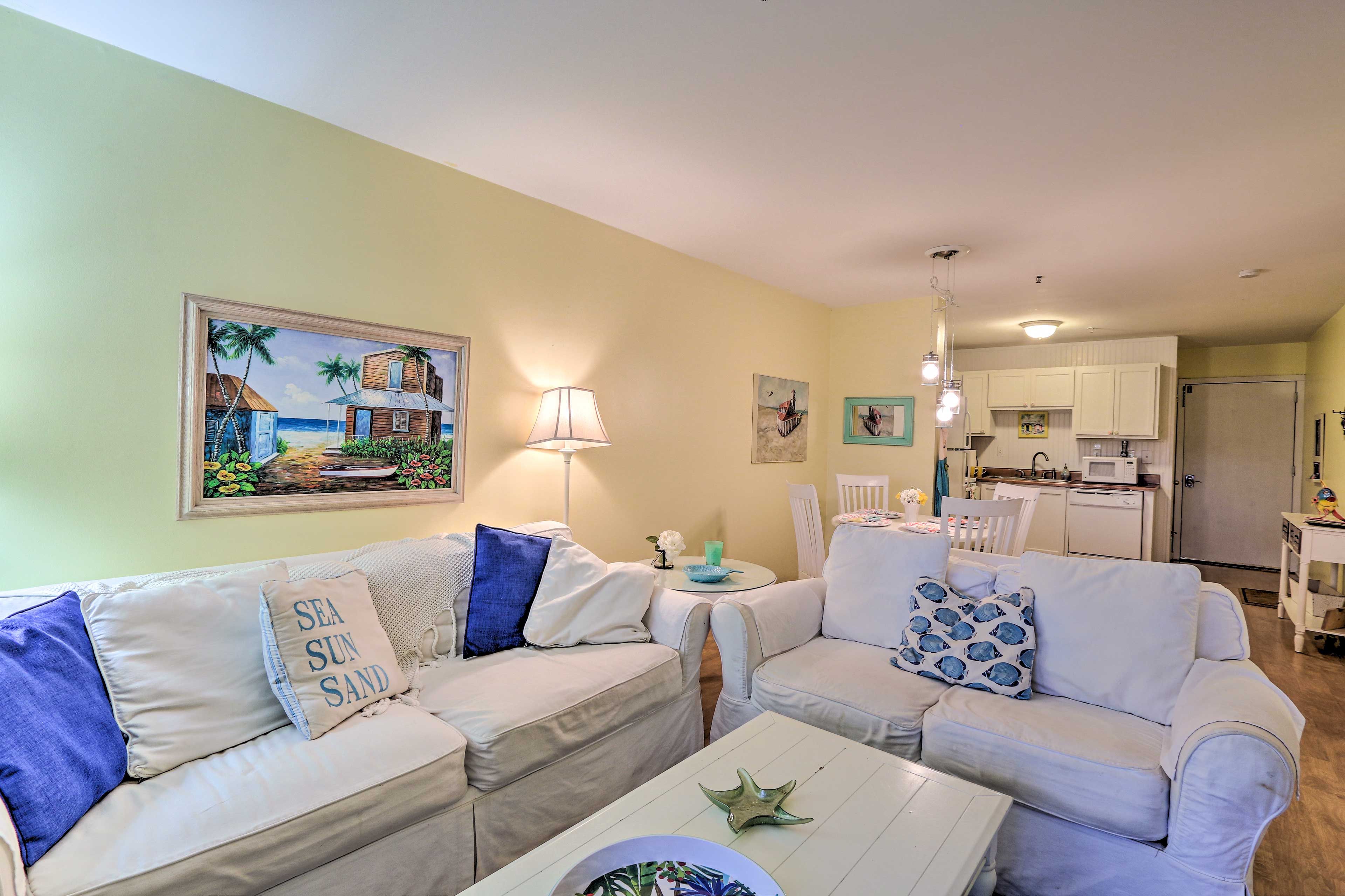 A living area hosts comfortable furnishings.