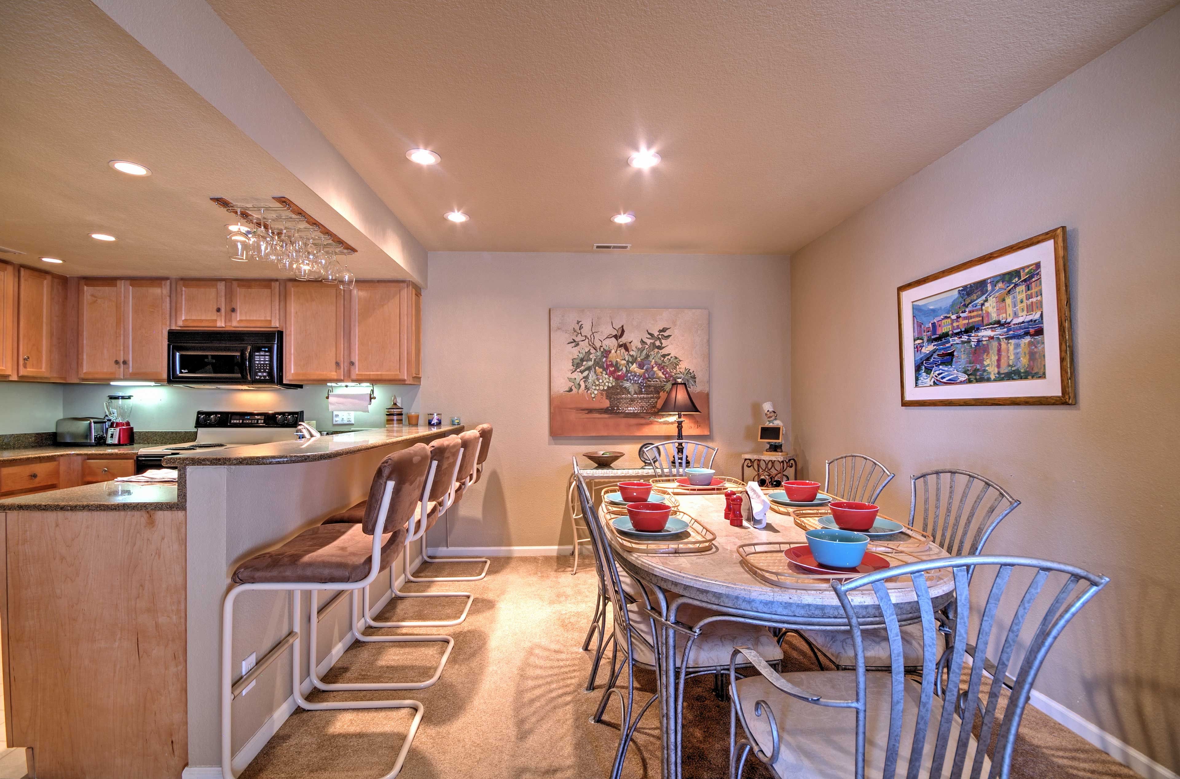 Pull a seat up to the bar or enjoy meals at the dining table.