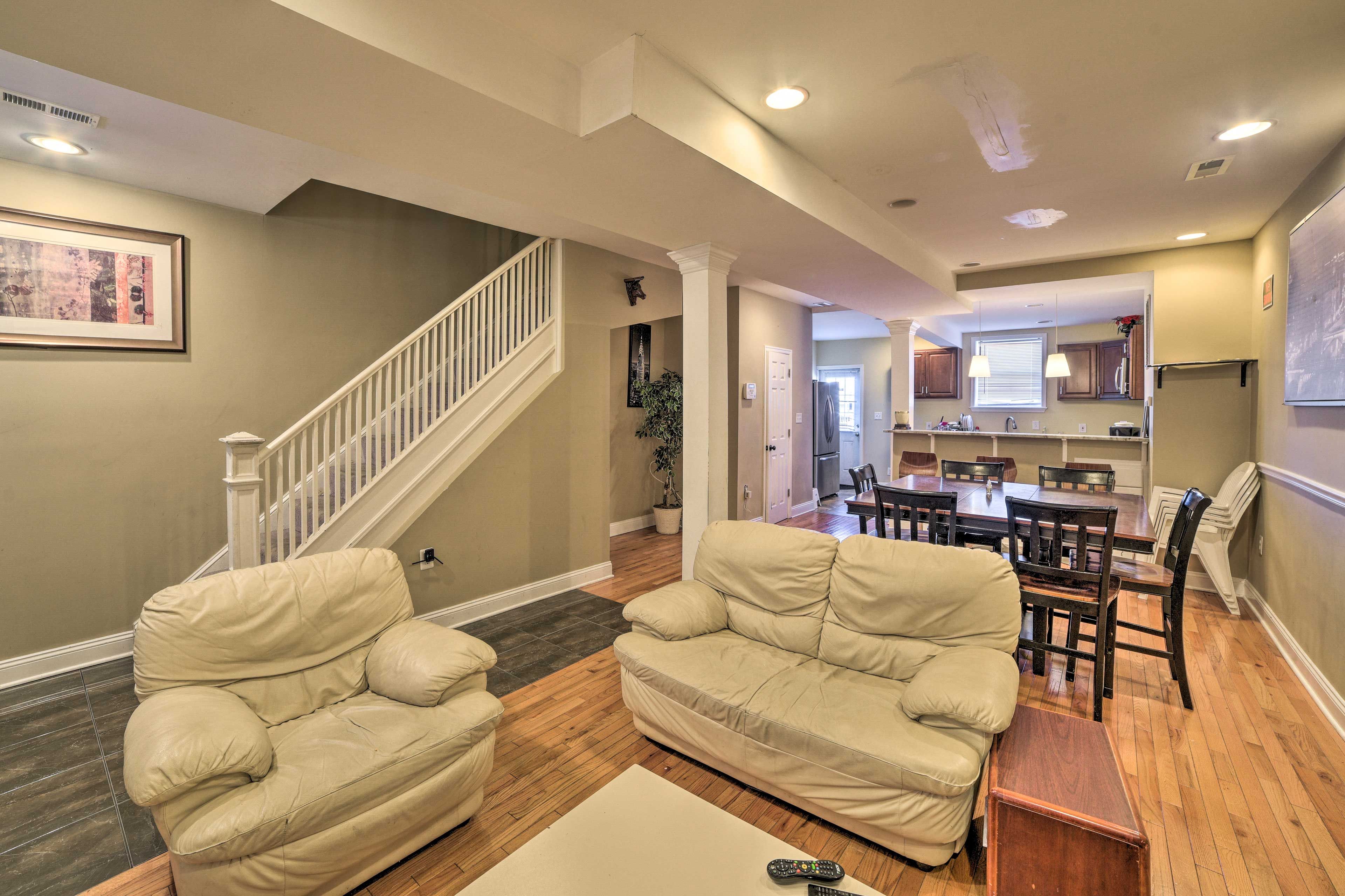 Enter the home to the living room complete with a flat-screen TV.
