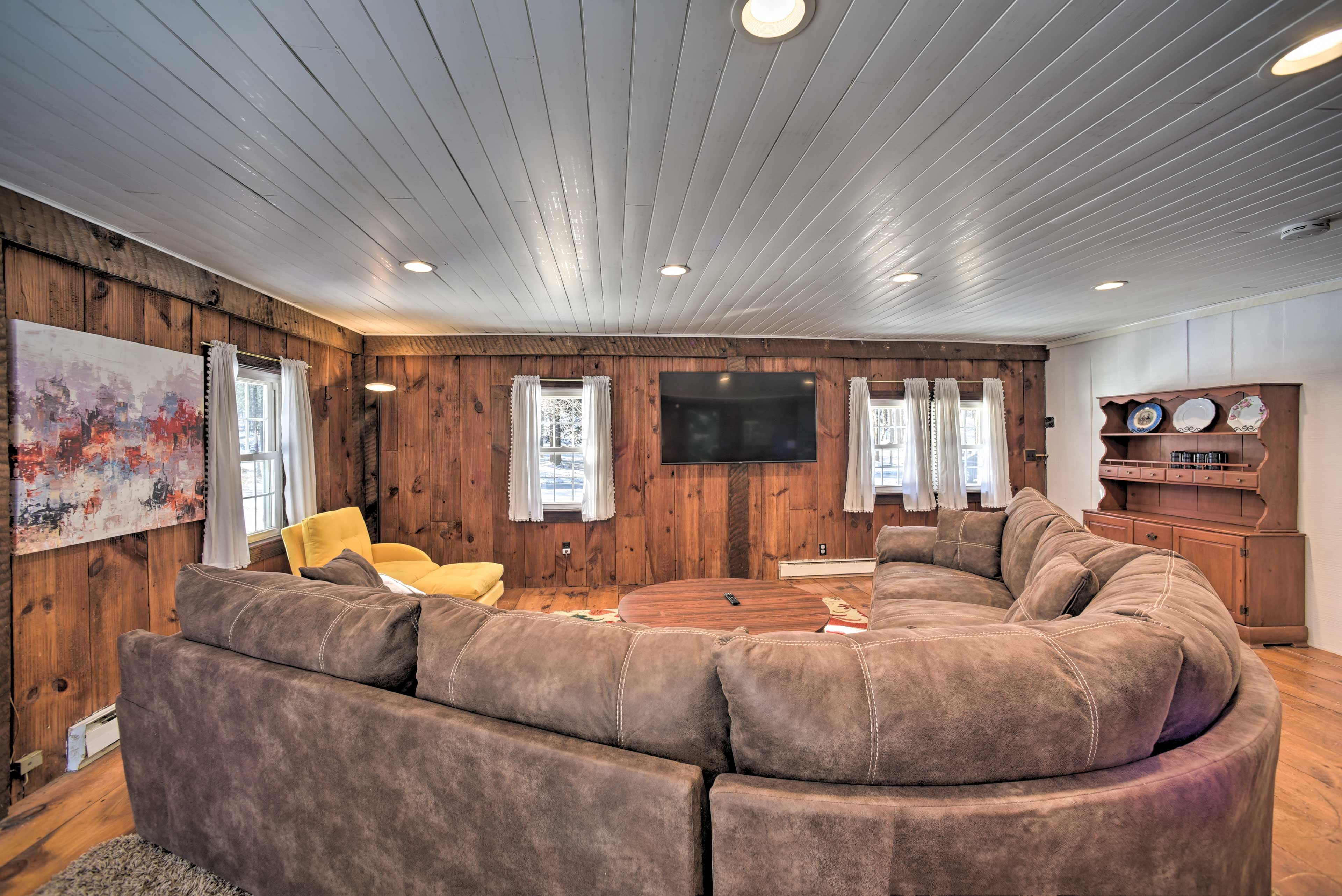 Living Room | Stairs to Access Home & Bedrooms | Electric Stove
