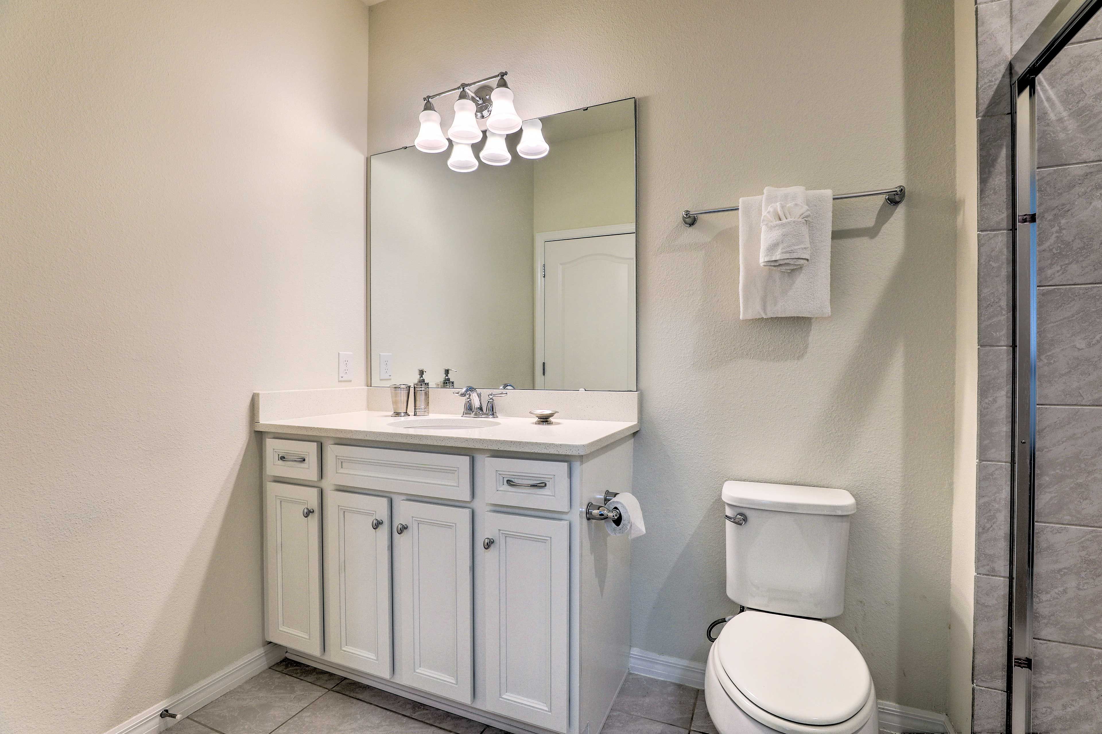 With 4 full bathrooms, this home ensures you'll never wait in line for a shower.