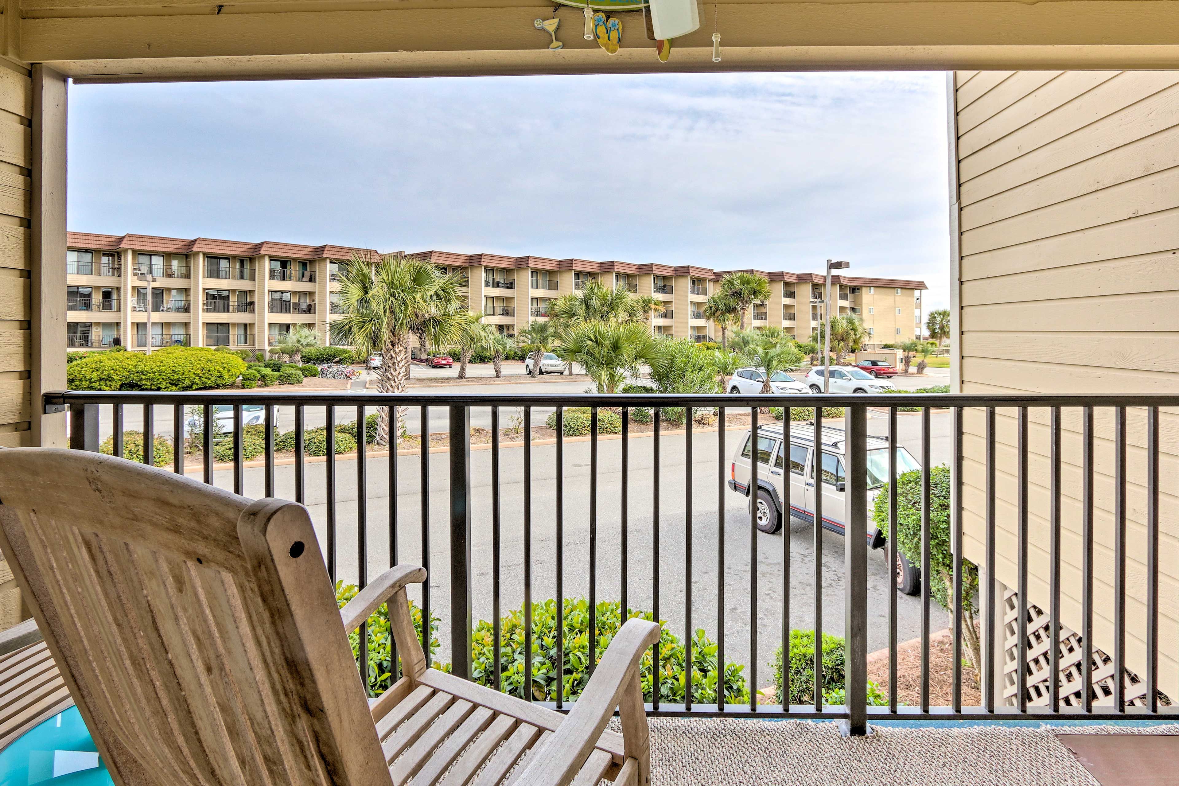 Head out to the deck furnished with rocking chairs.