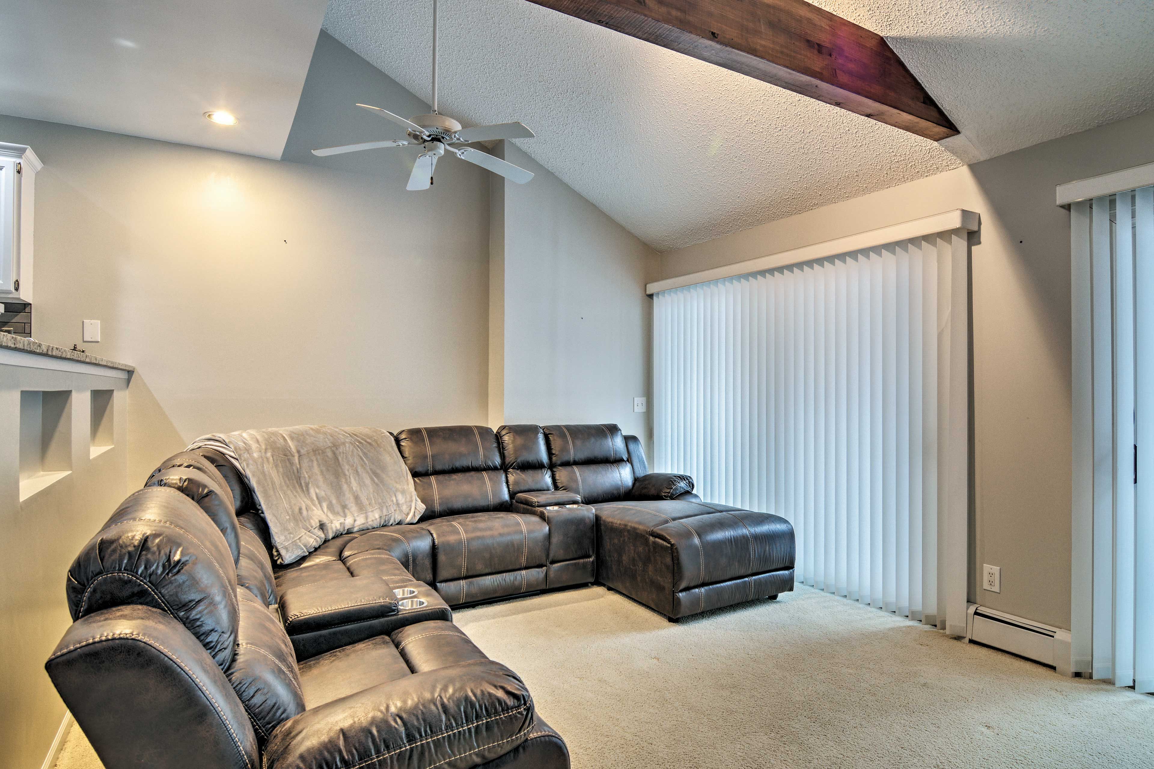 Large windows & high ceilings invite you to this Harbor Springs vacation rental.