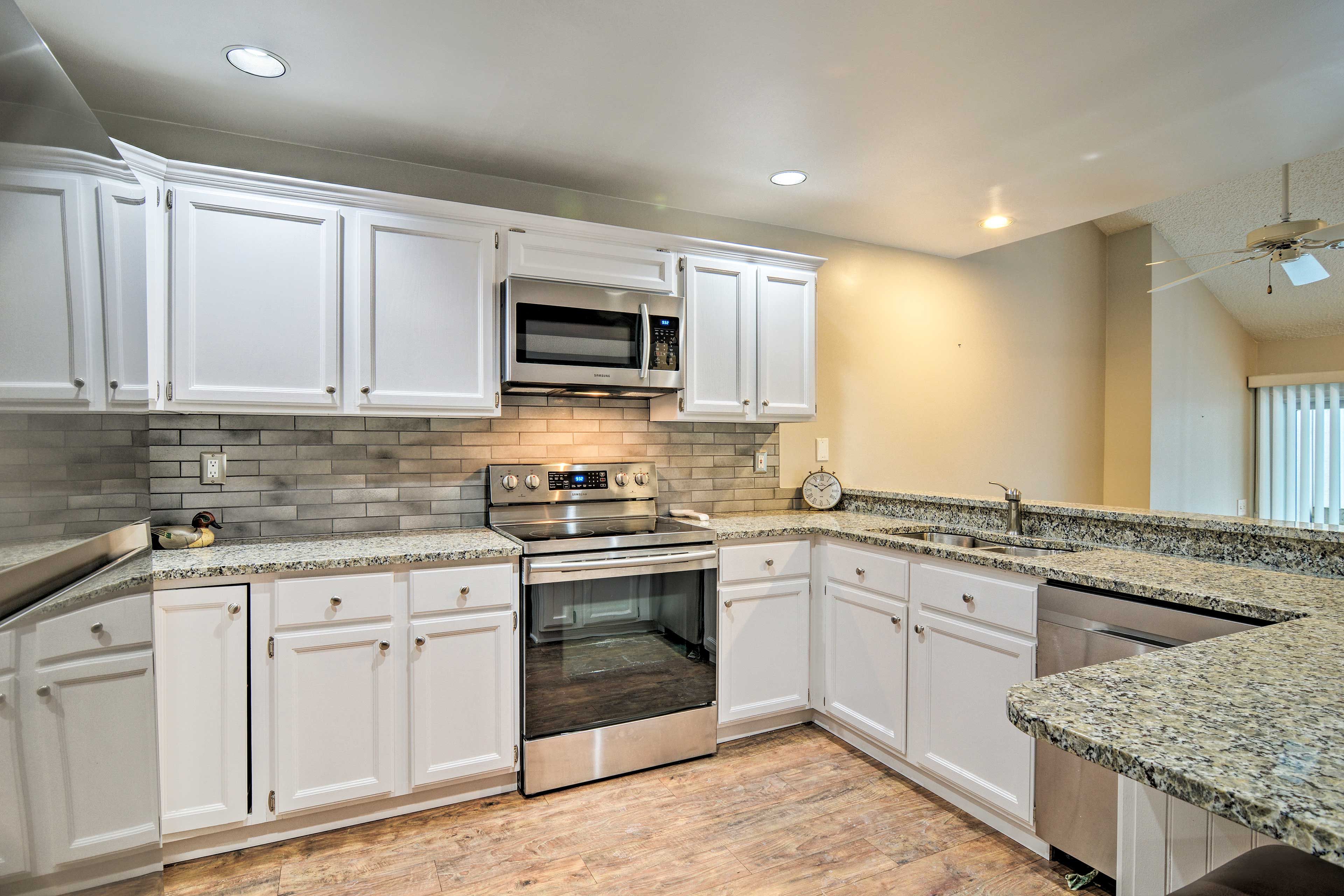 Stainless steel appliances highlight the kitchen.