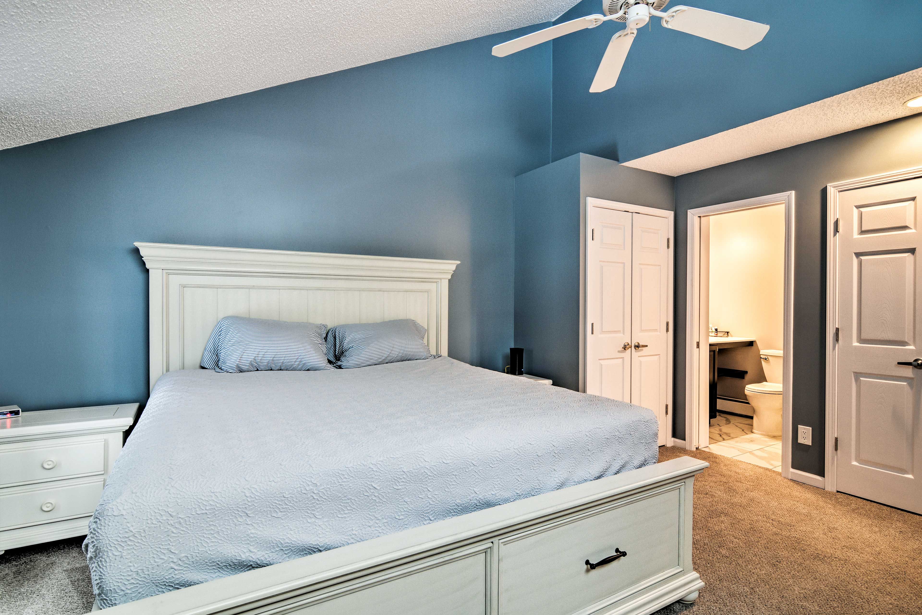Claim the queen bed as your own.