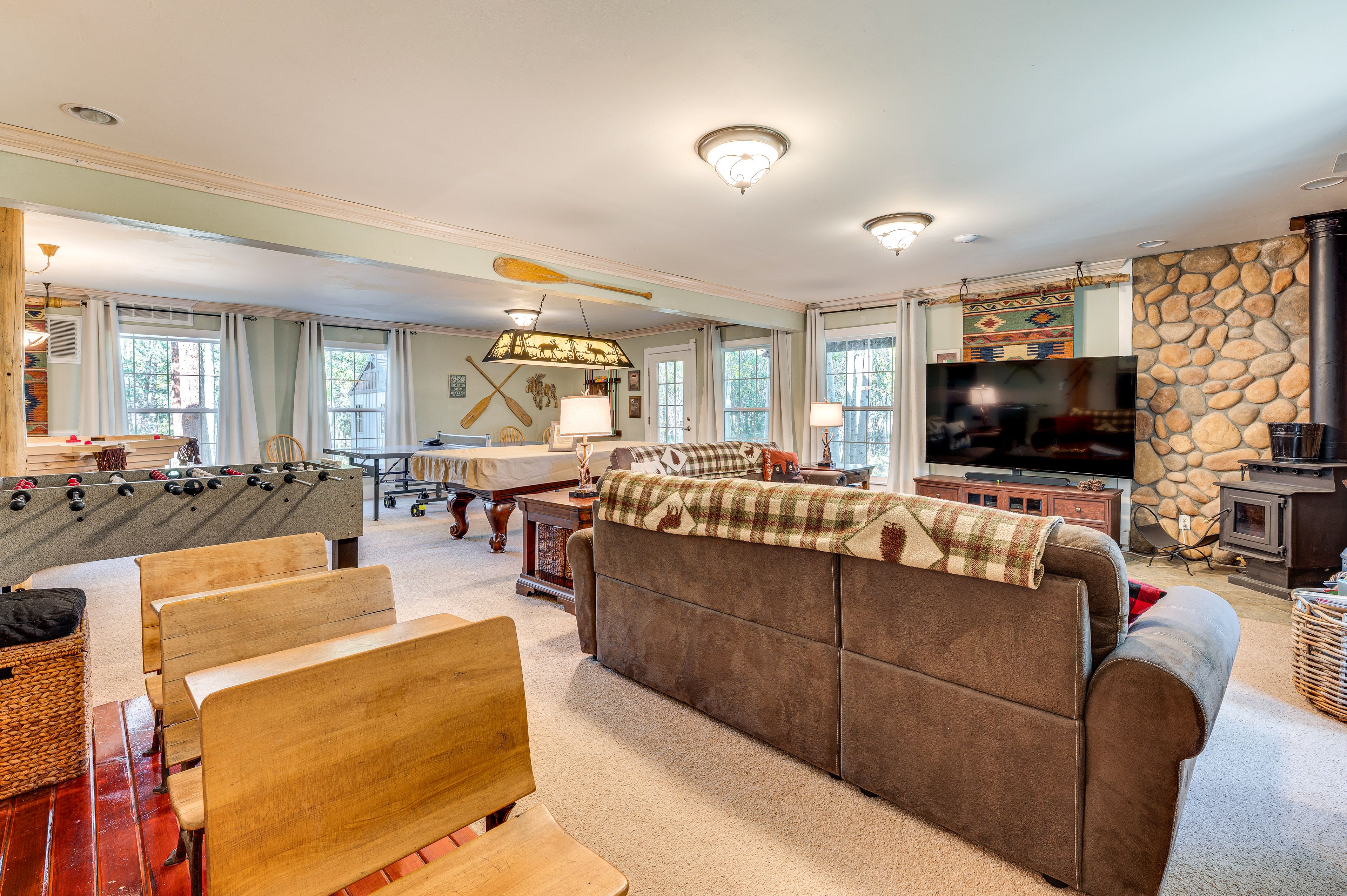 Family Room | 2 Full Futons | Wood-Burning Stove | Basement Level