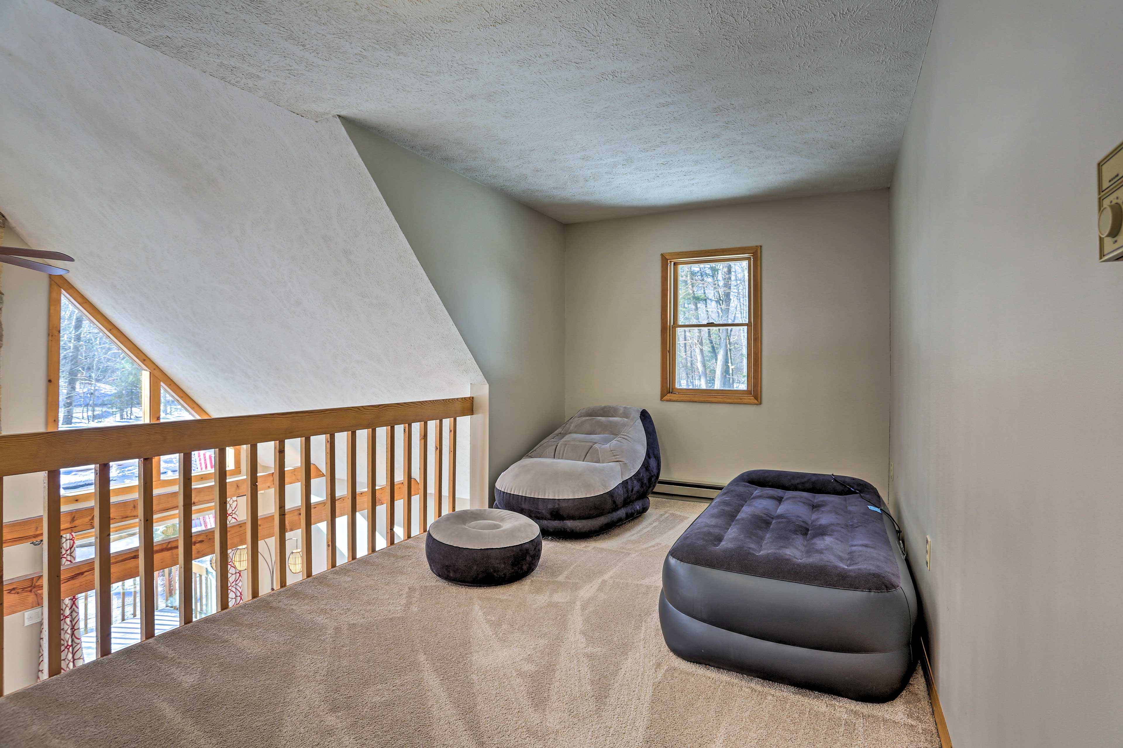Got extra guests? Blow up the air mattress in the overhead loft!